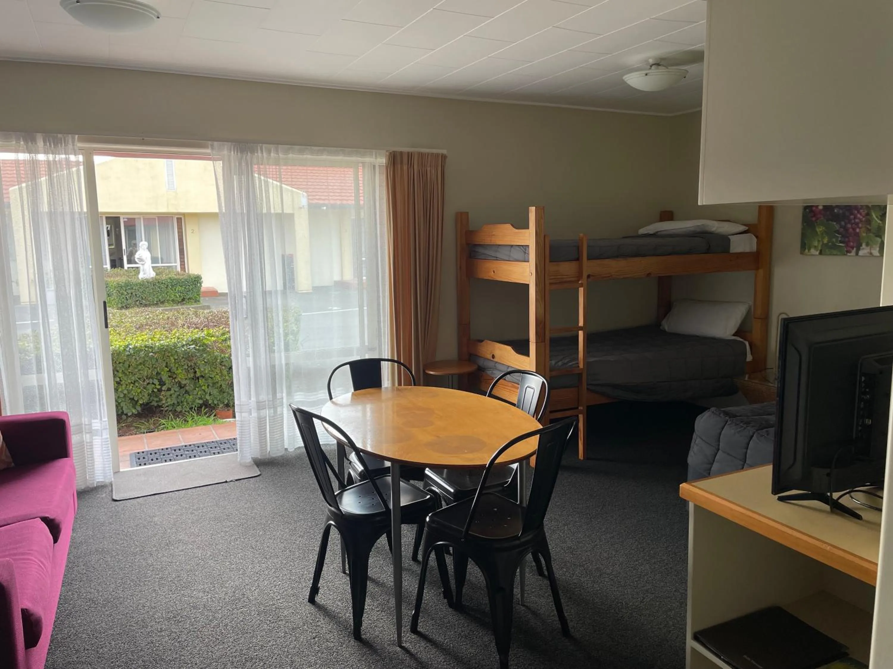 Bed in Bella Tuscany Motor Lodge