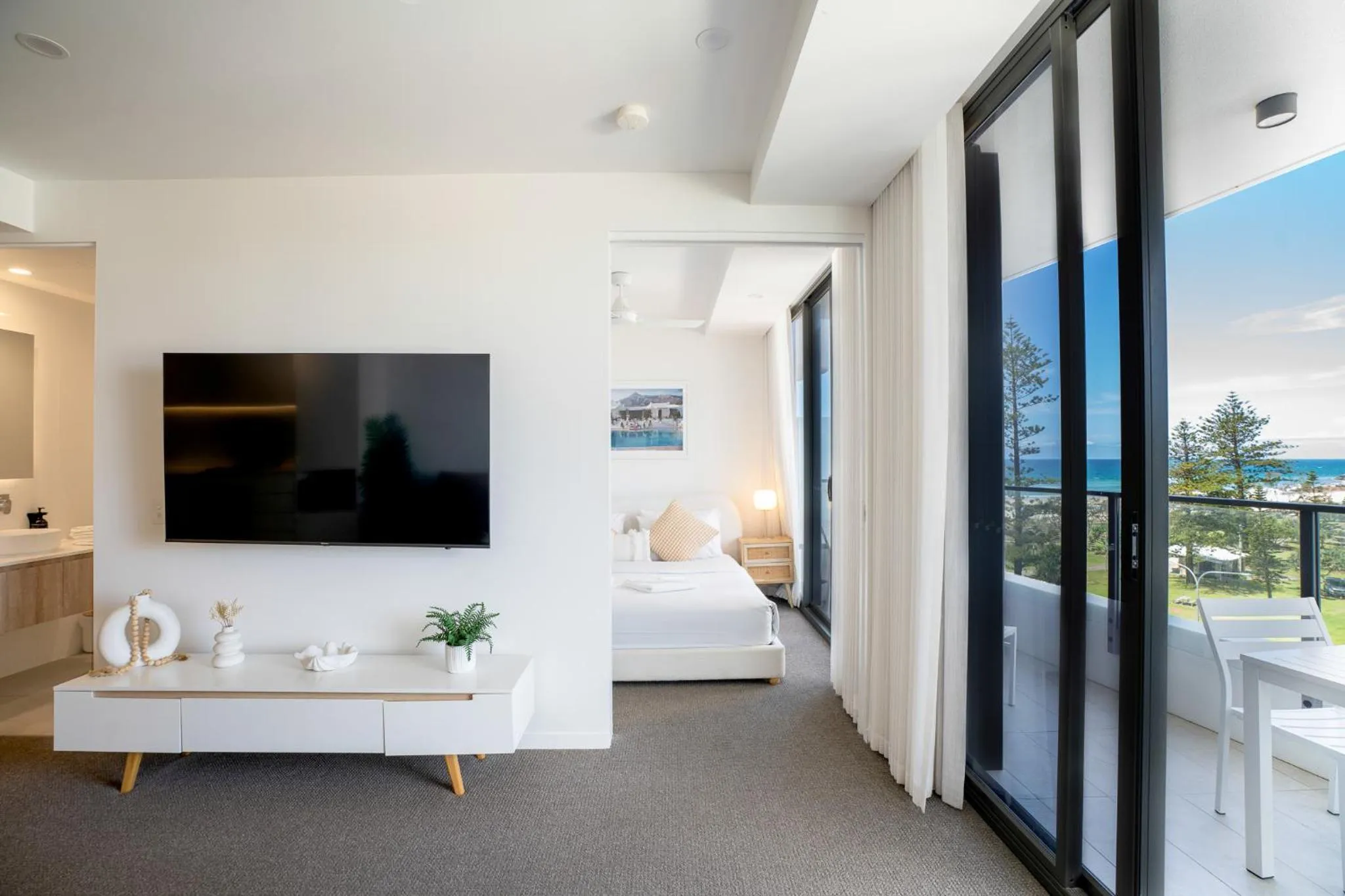 TV and multimedia in X Kirra Apartments