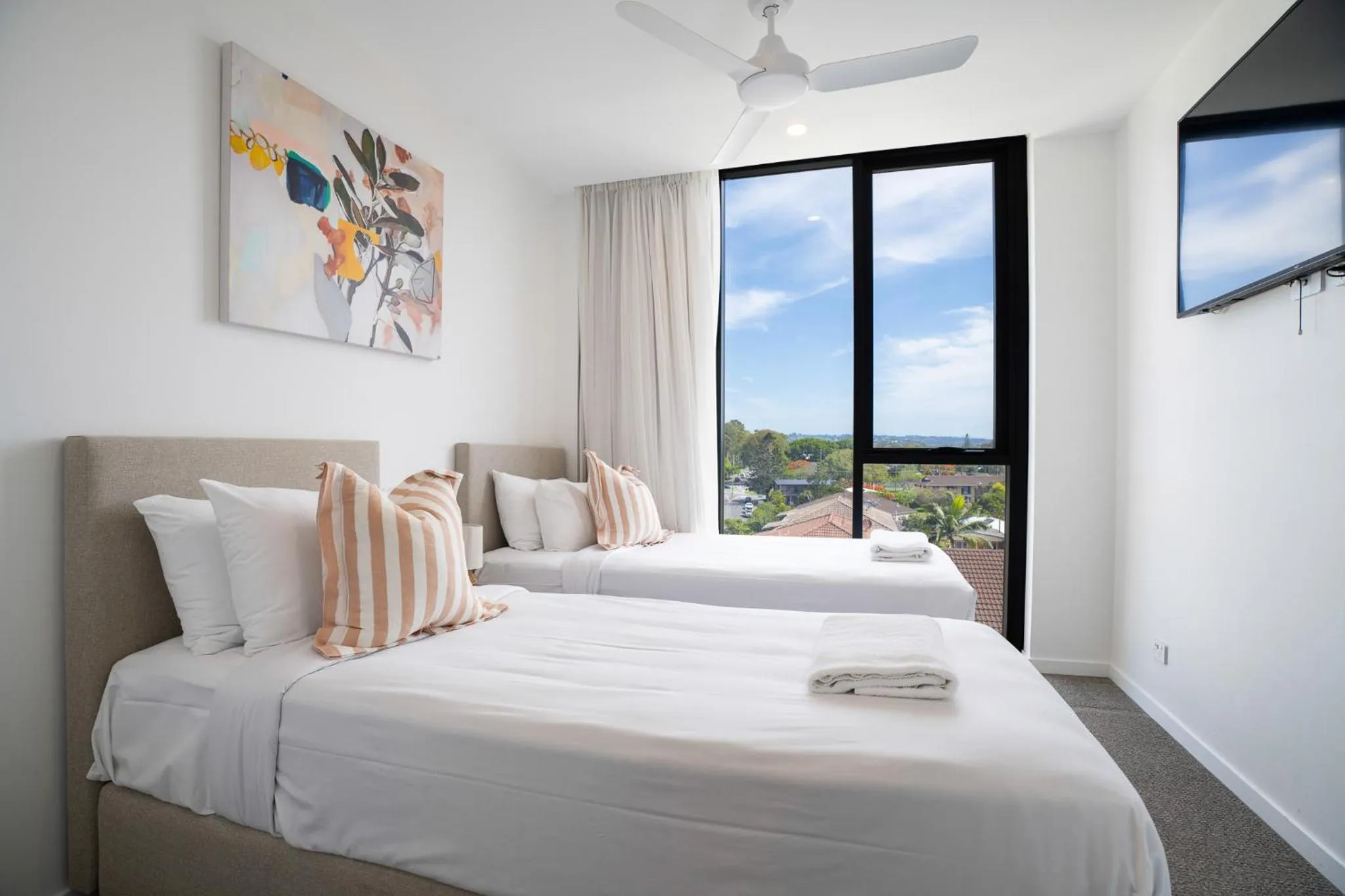 Bed in X Kirra Apartments