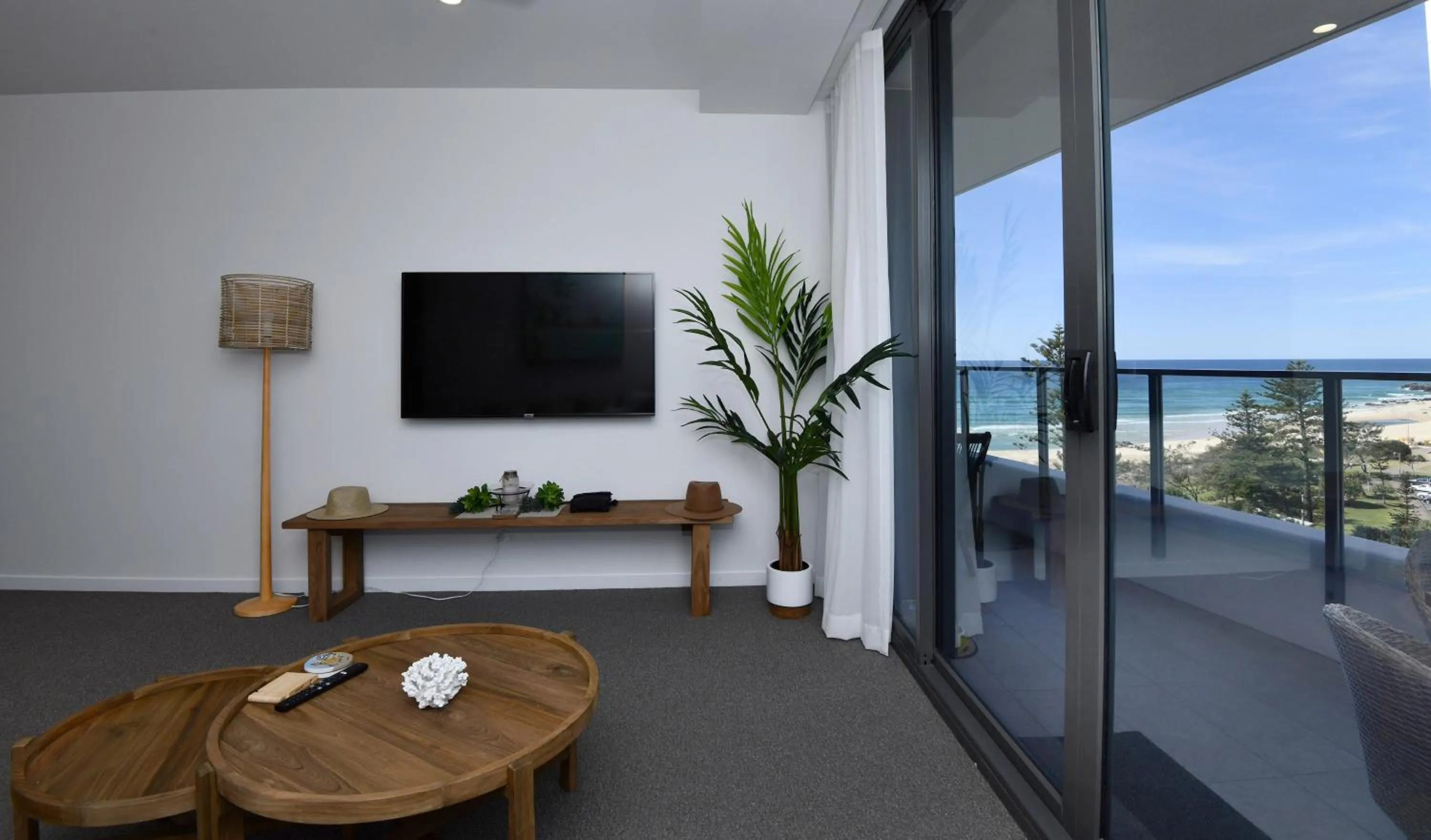 TV and multimedia in X Kirra Apartments