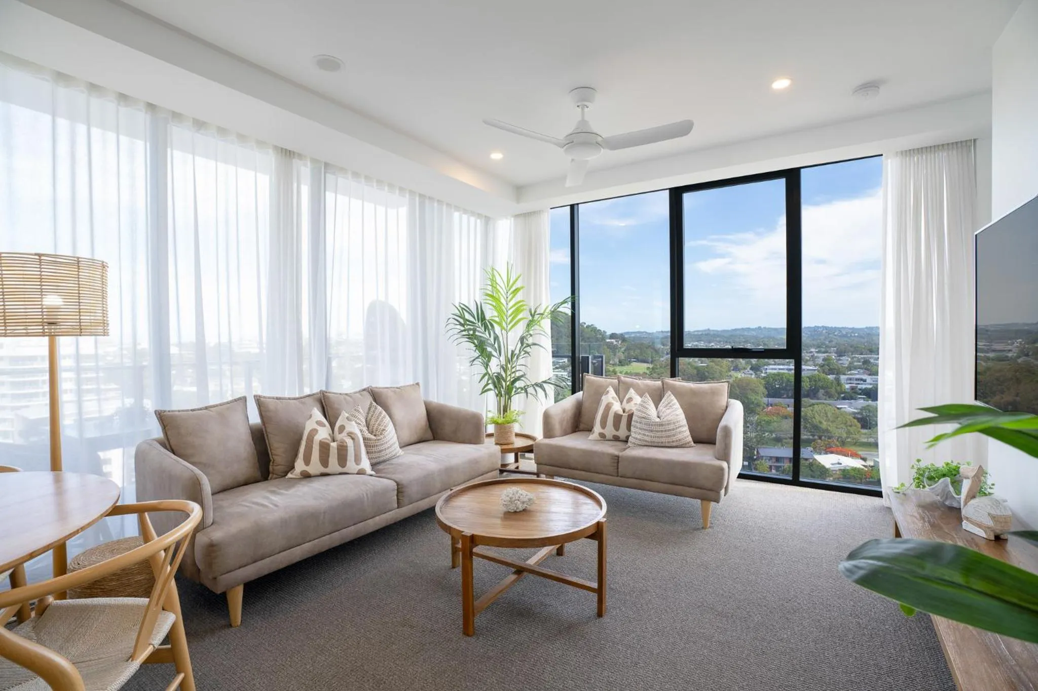 Living room in X Kirra Apartments