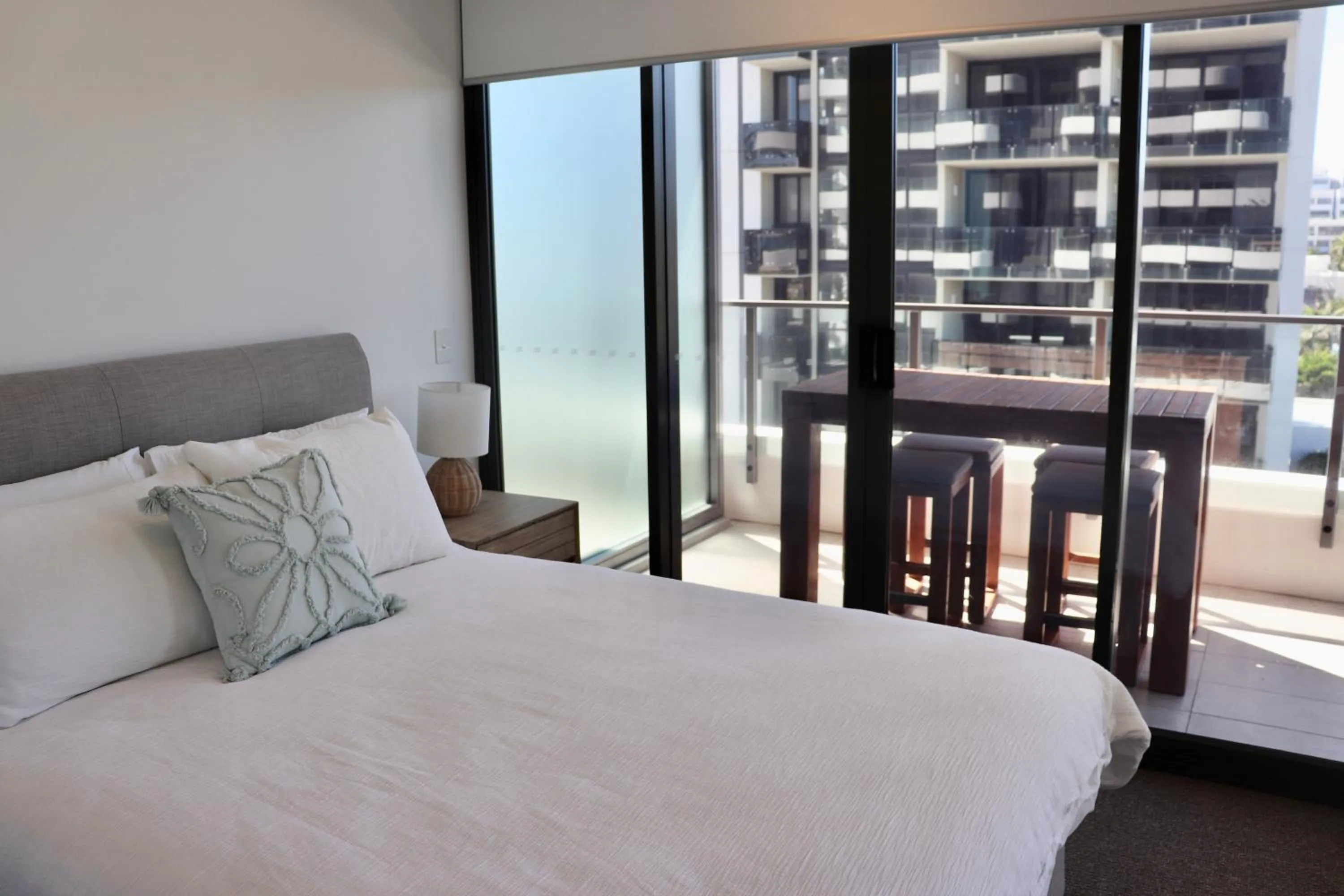 Bed in X Kirra Apartments