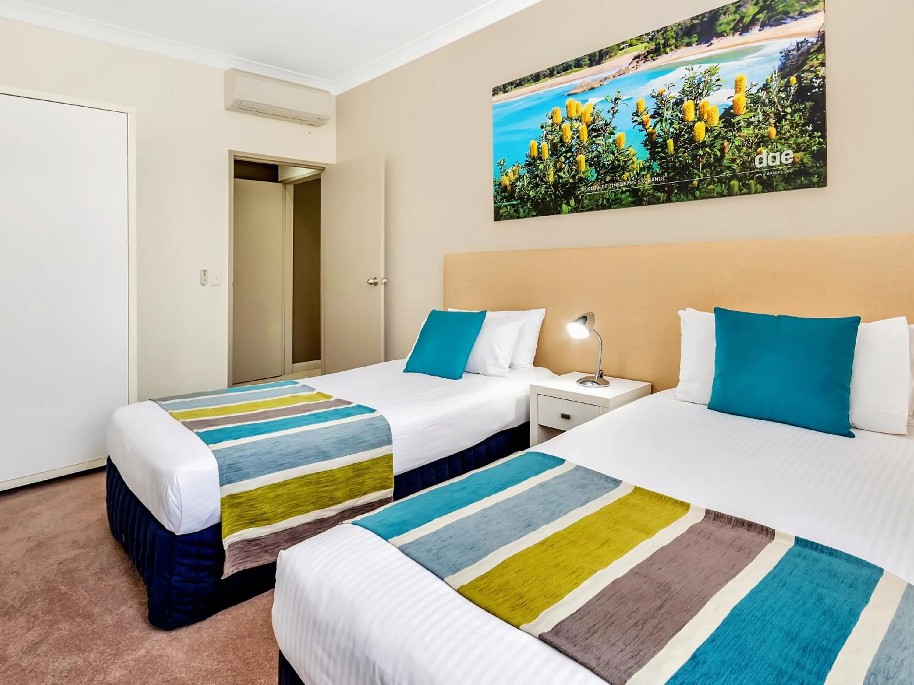 Bed in Korora Bay Village Resort
