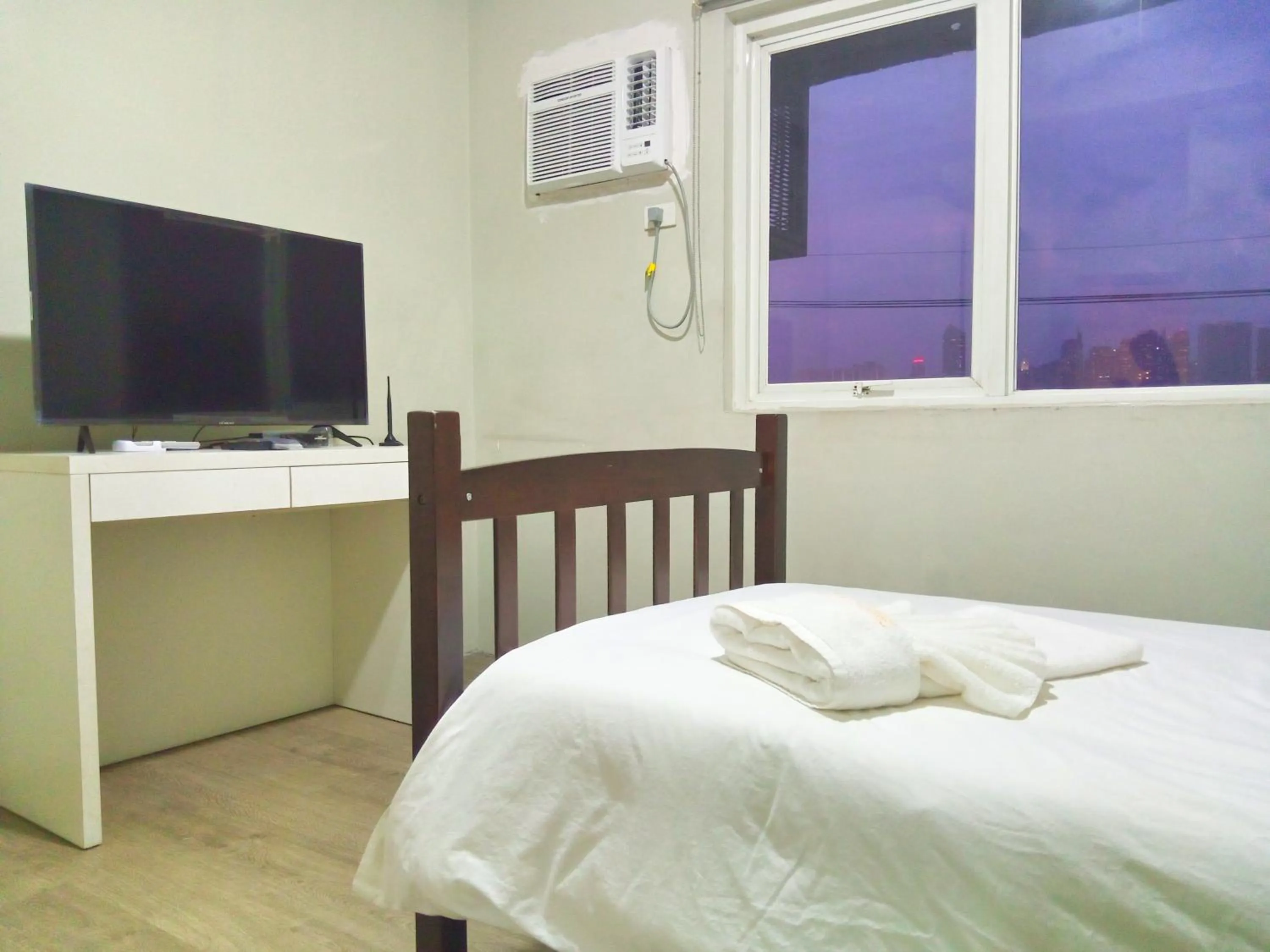 TV/Entertainment Center in White Knight Hotel Saint Anne