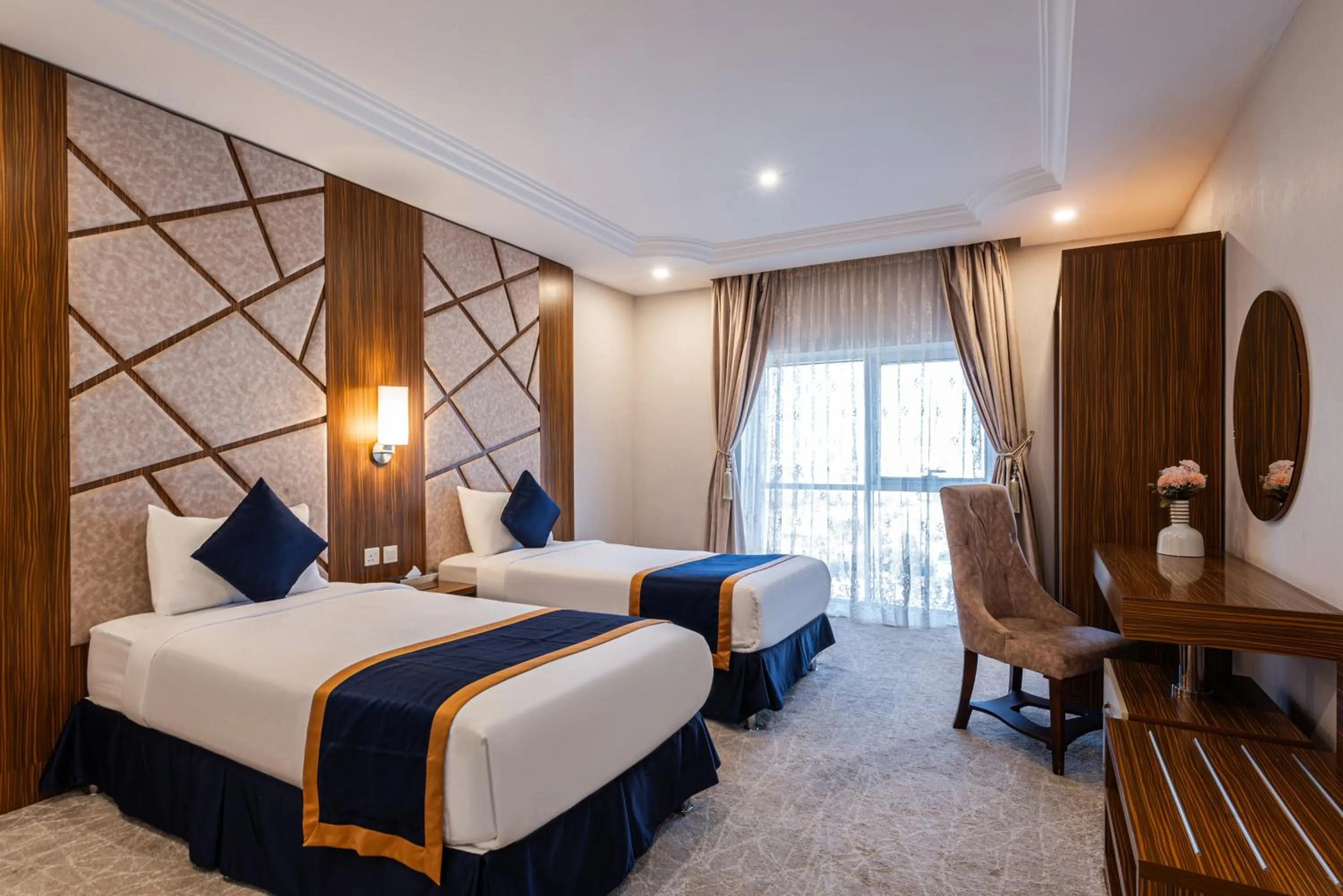Bed in The Palaces Hotel Suites - Wadeen