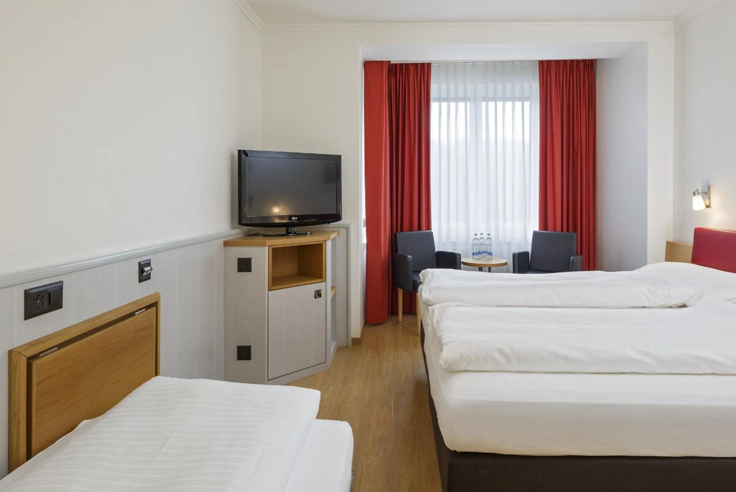 Bedroom, Bed in Swiss Star Irchel - Self Check-In