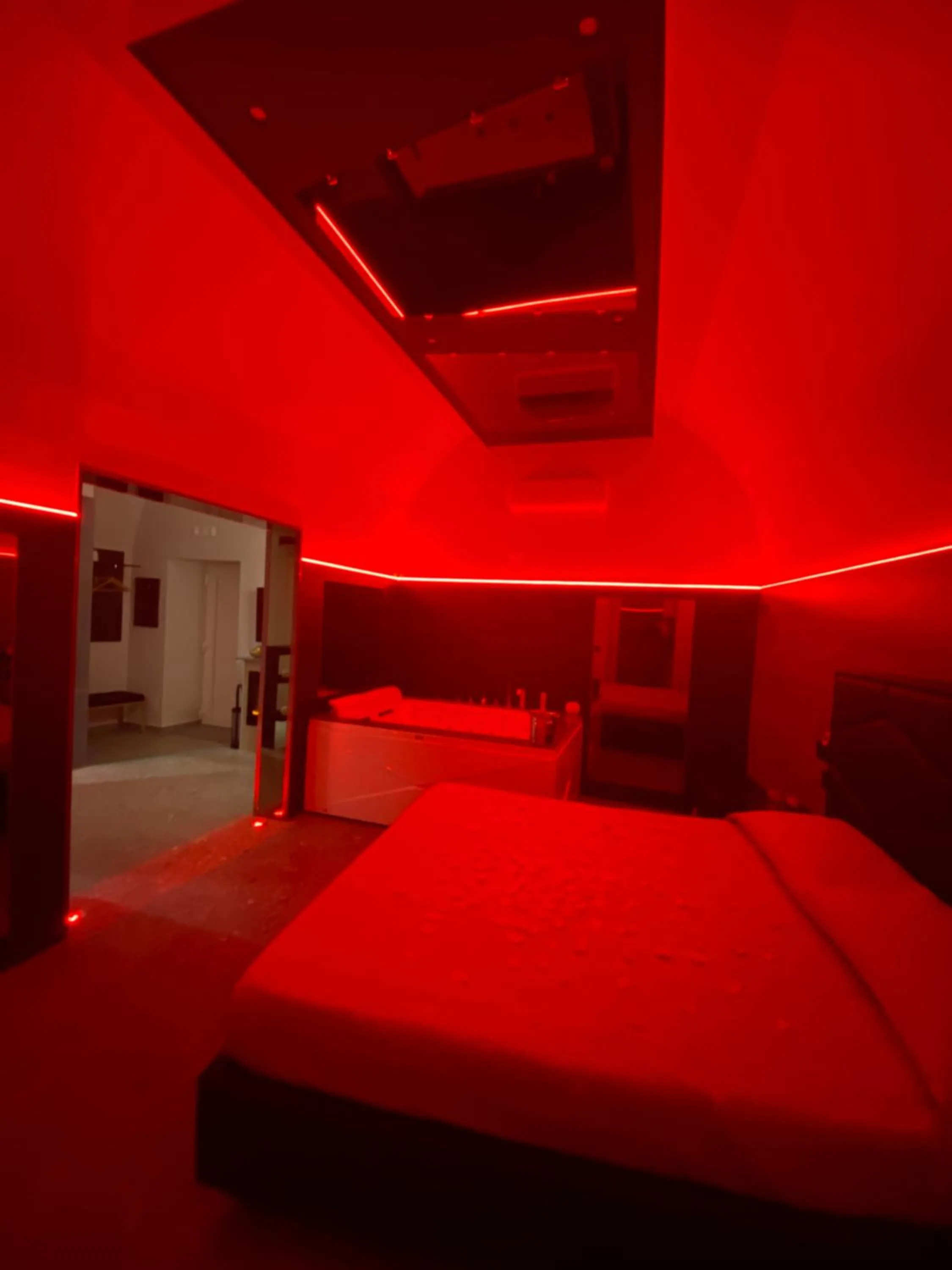 Photo of the whole room, Bed in Rebel Suite love