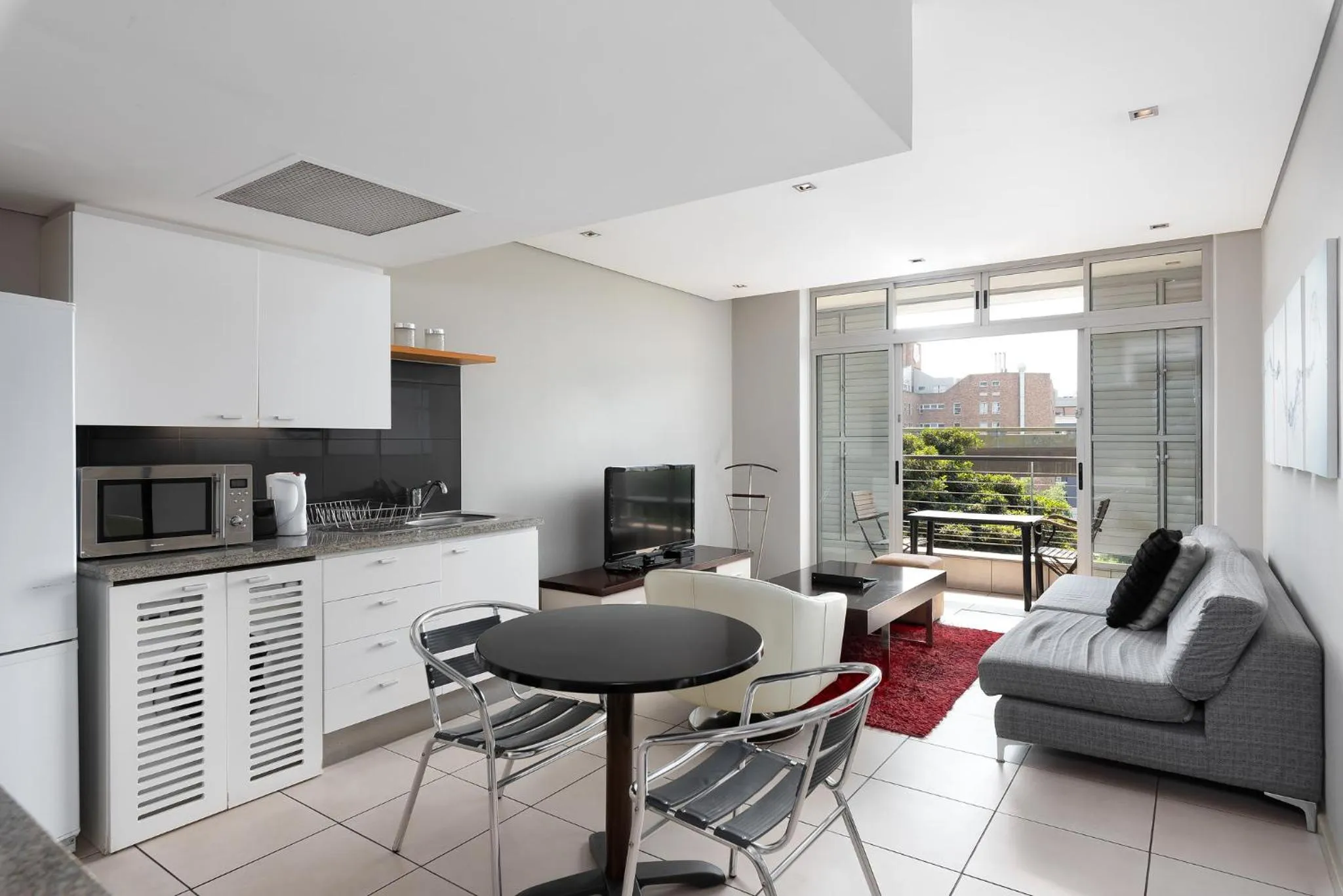 Kitchen or kitchenette, Kitchen/Kitchenette in HarbourEdge Suites by Totalstay