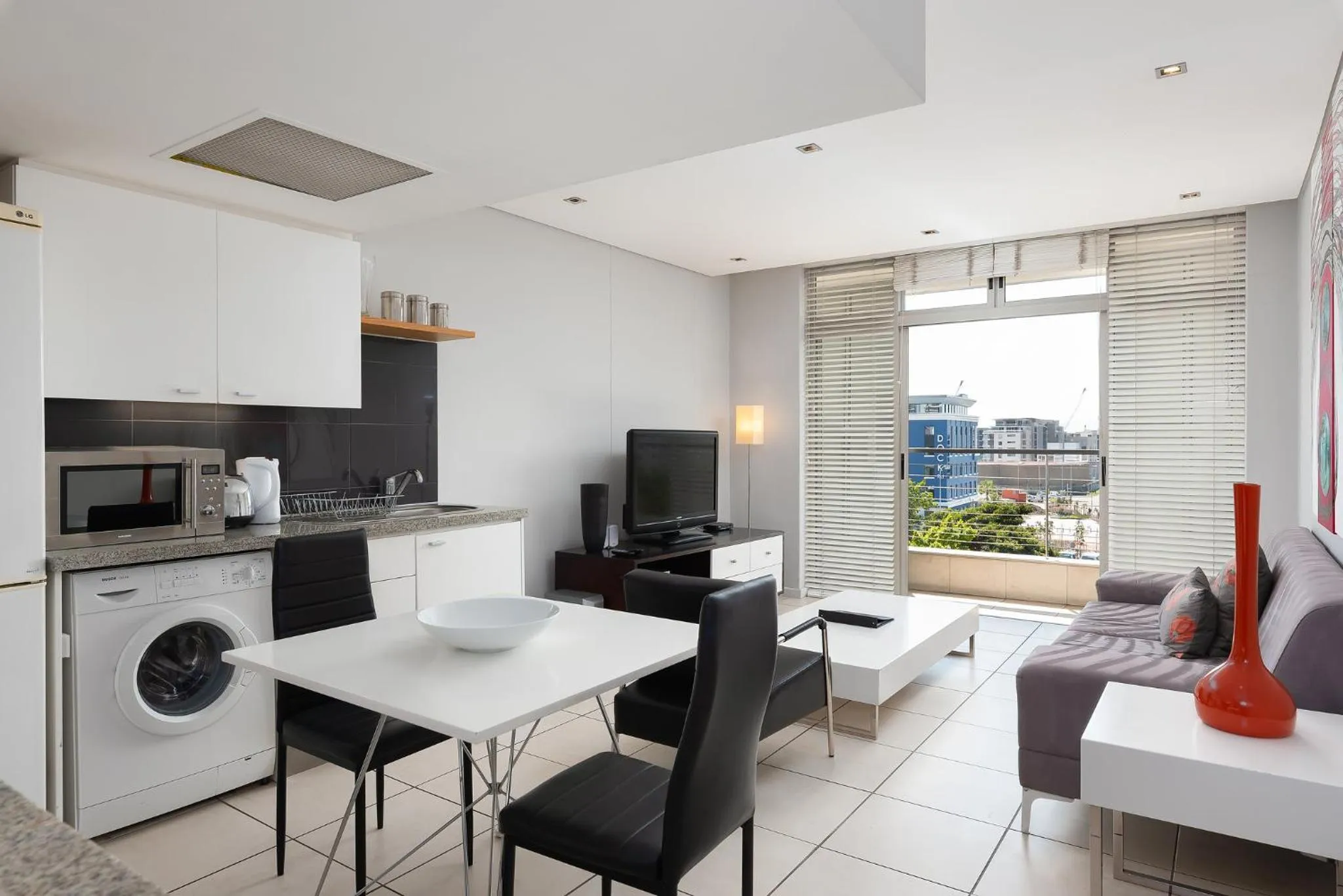 Dining Area in HarbourEdge Suites by Totalstay