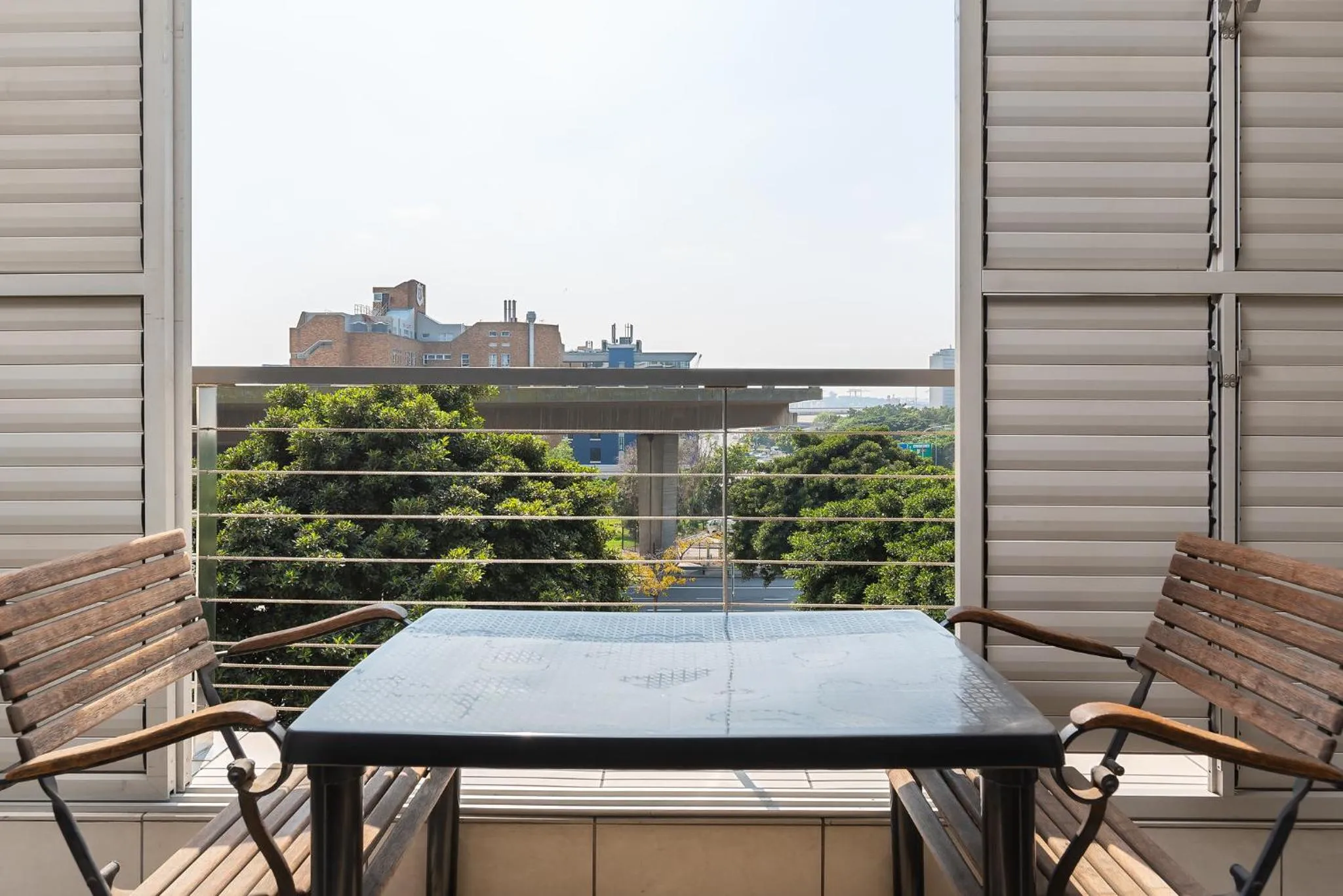 Balcony/Terrace in HarbourEdge Suites by Totalstay