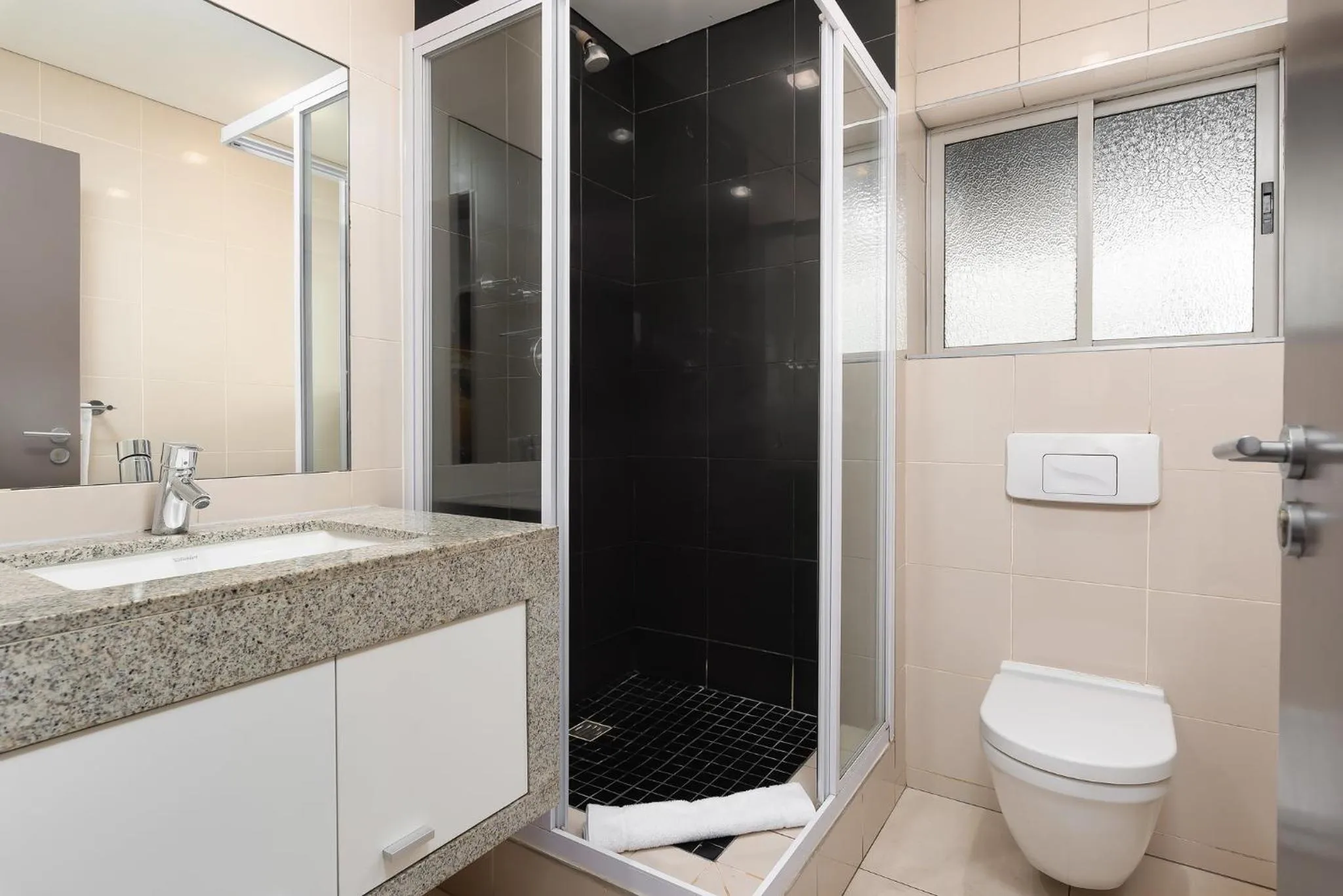 Bathroom in HarbourEdge Suites by Totalstay