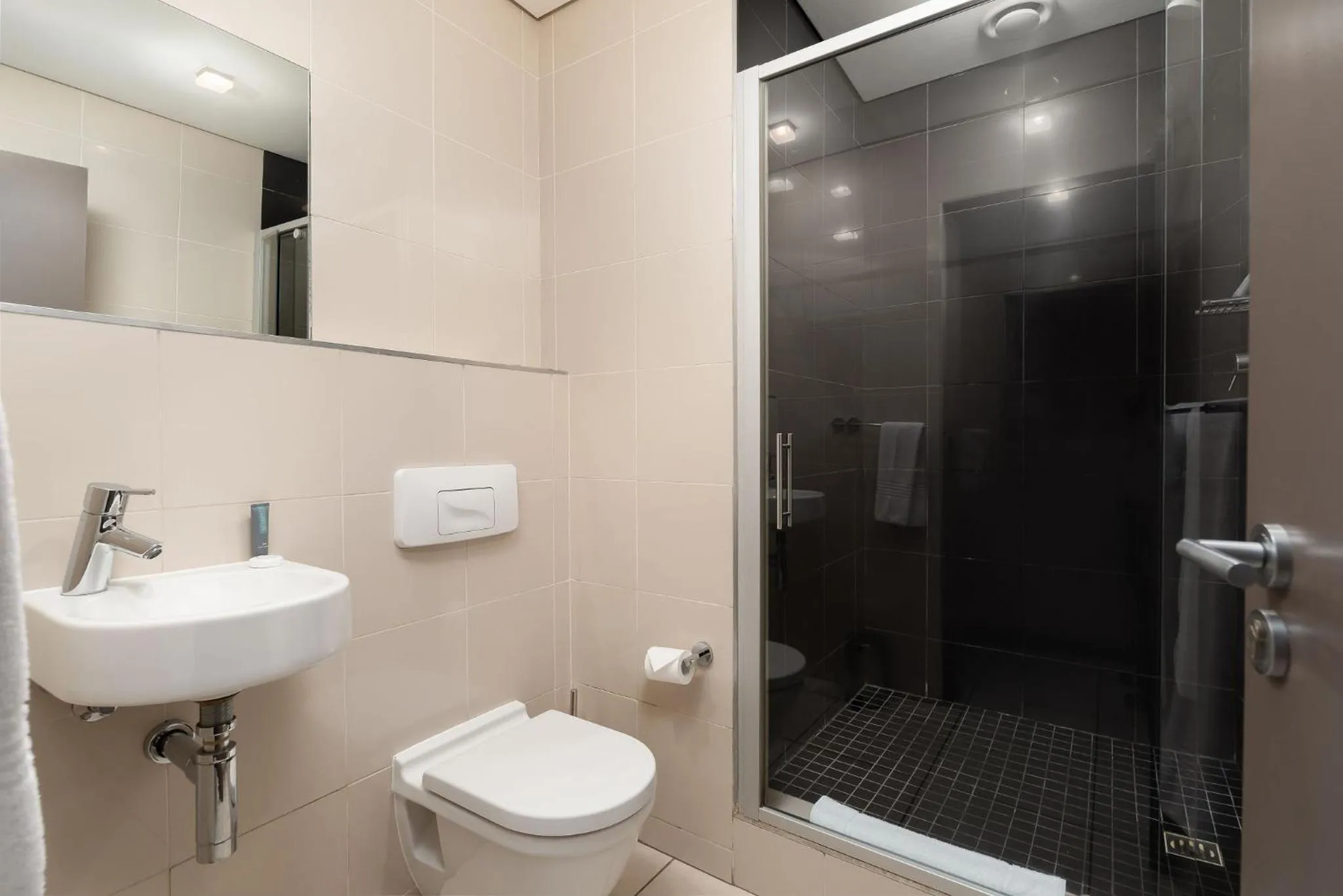 Bathroom in HarbourEdge Suites by Totalstay