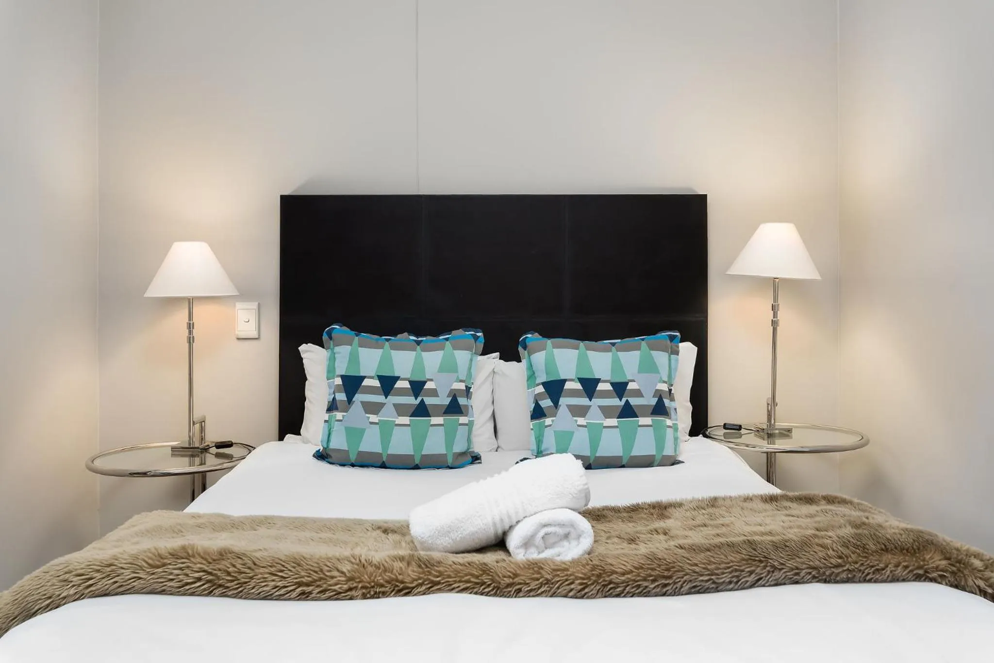 Bed in HarbourEdge Suites by Totalstay