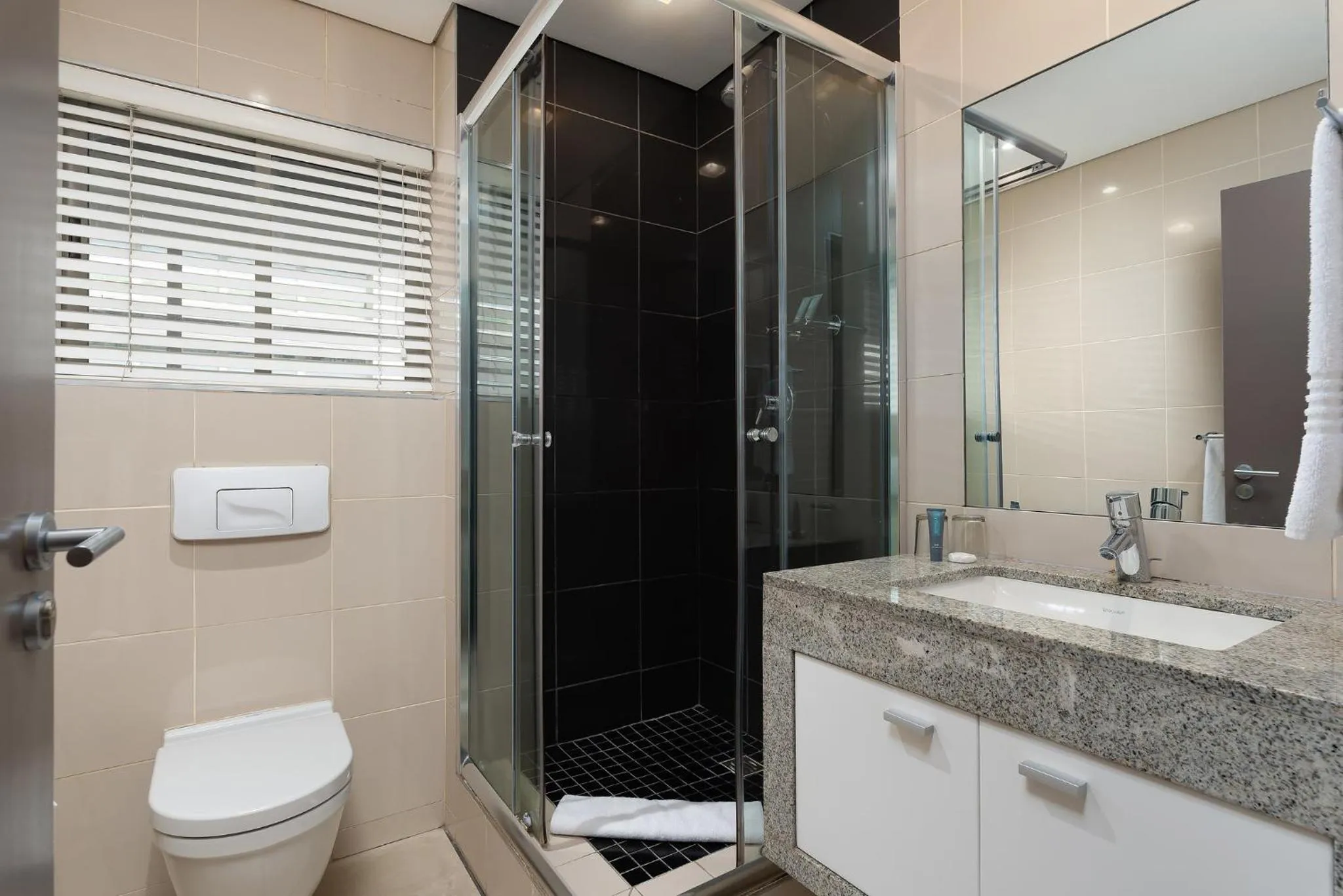 Bathroom in HarbourEdge Suites by Totalstay