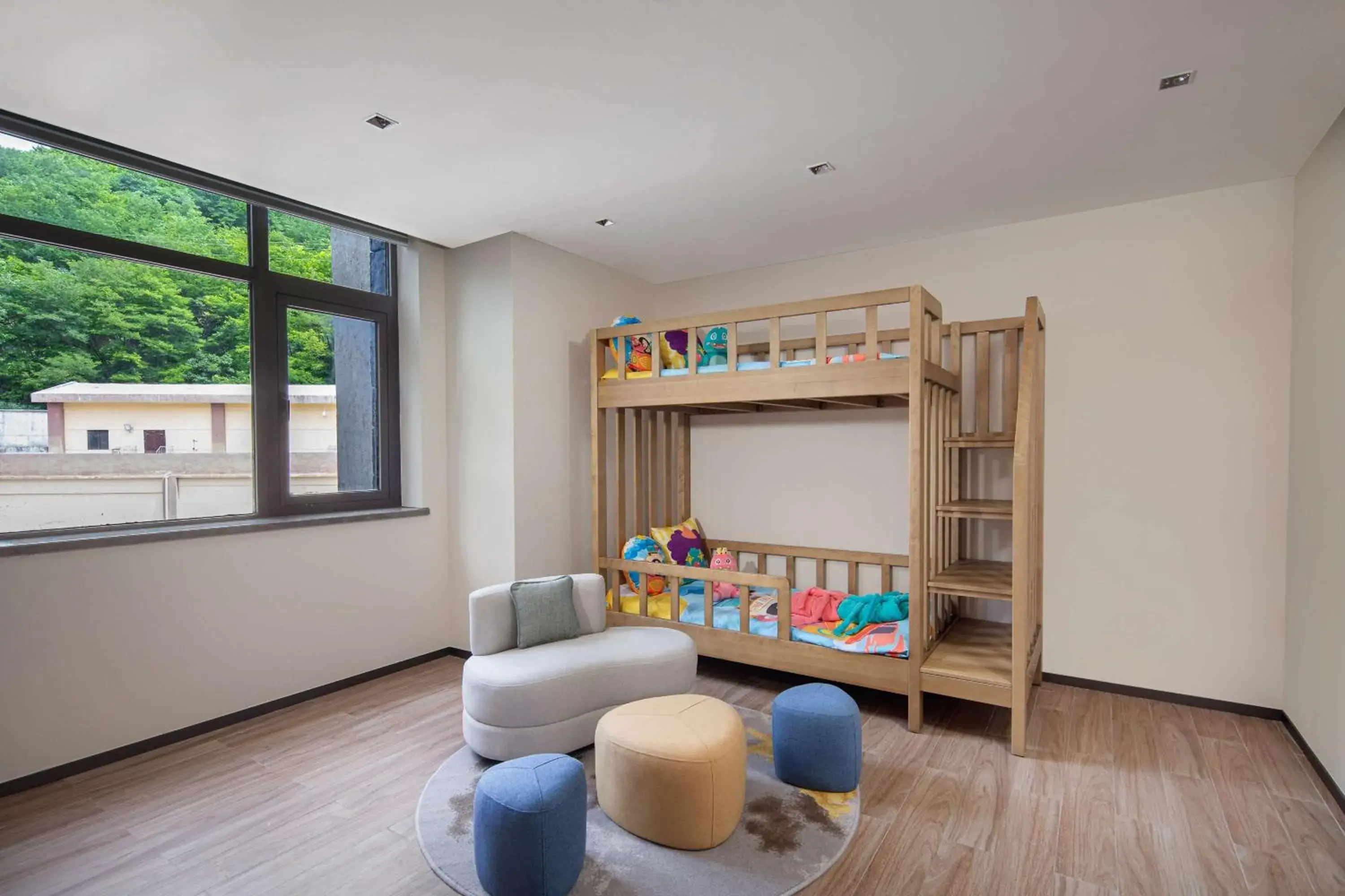 Living room in Hilton Garden Inn Jiuzhaigou Living room in Hilton Garden Inn Jiuzhaigou