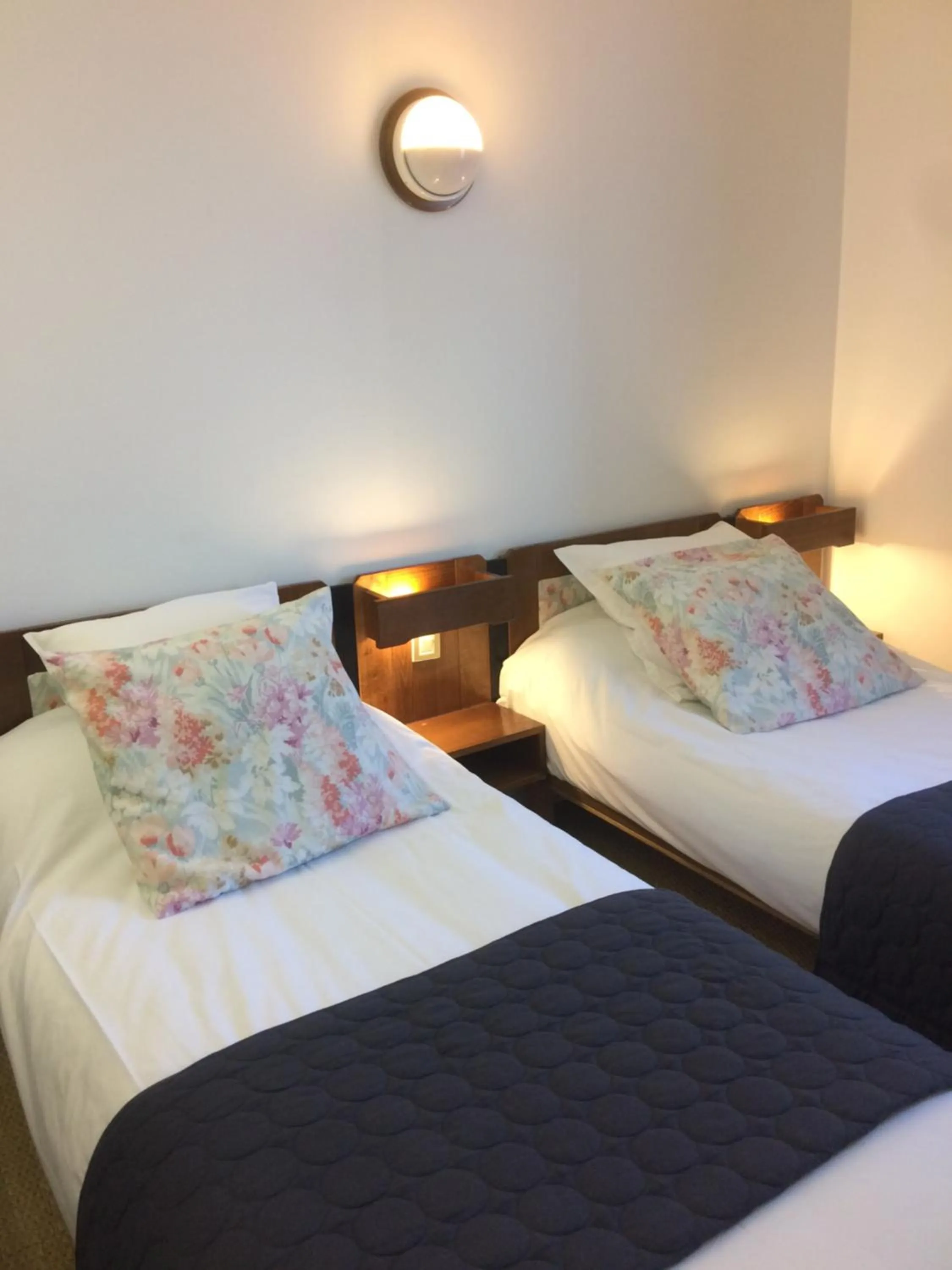 Bed in Logis Hôtel LE DAHU