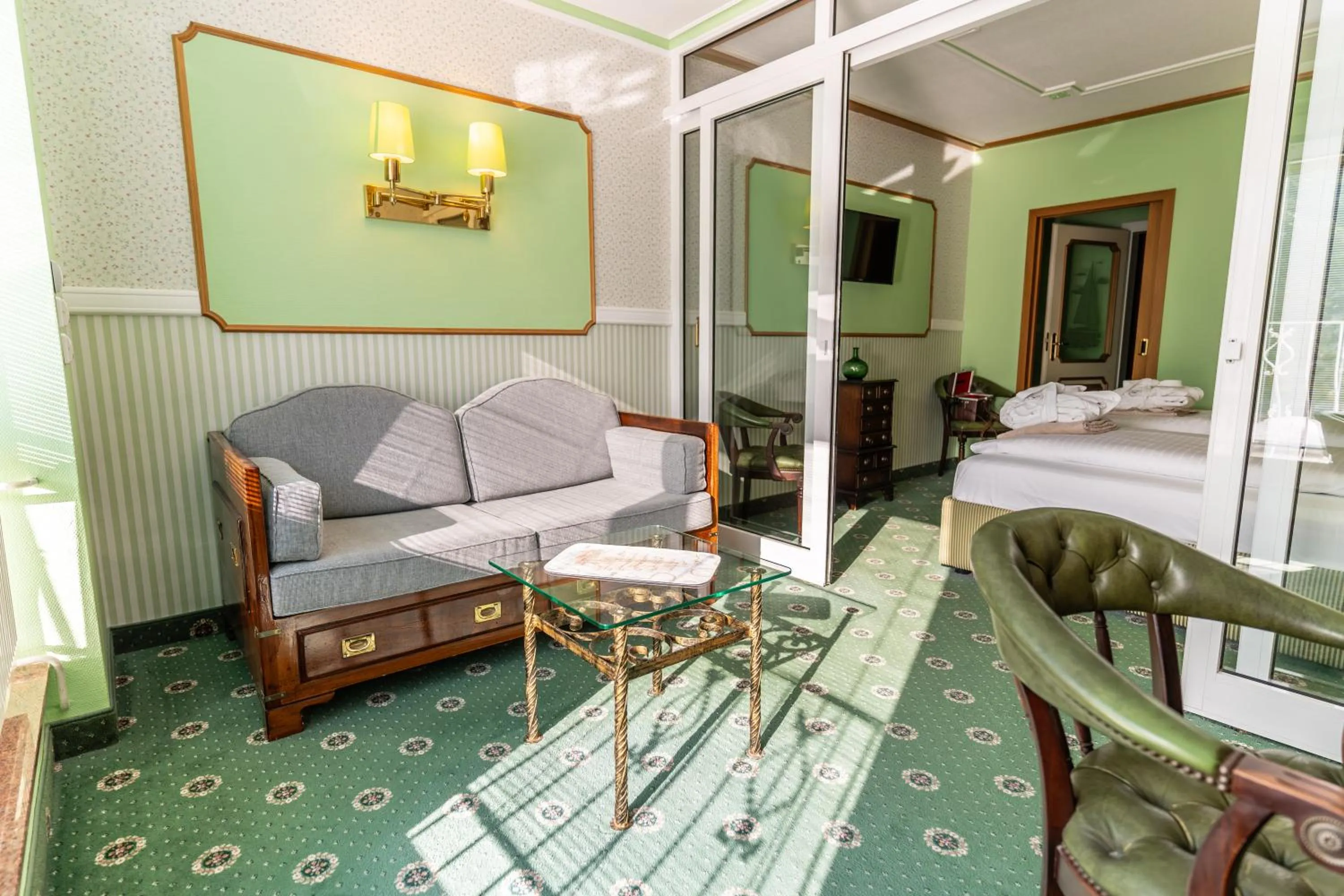 Living room, Bed in Hotel Strandperle