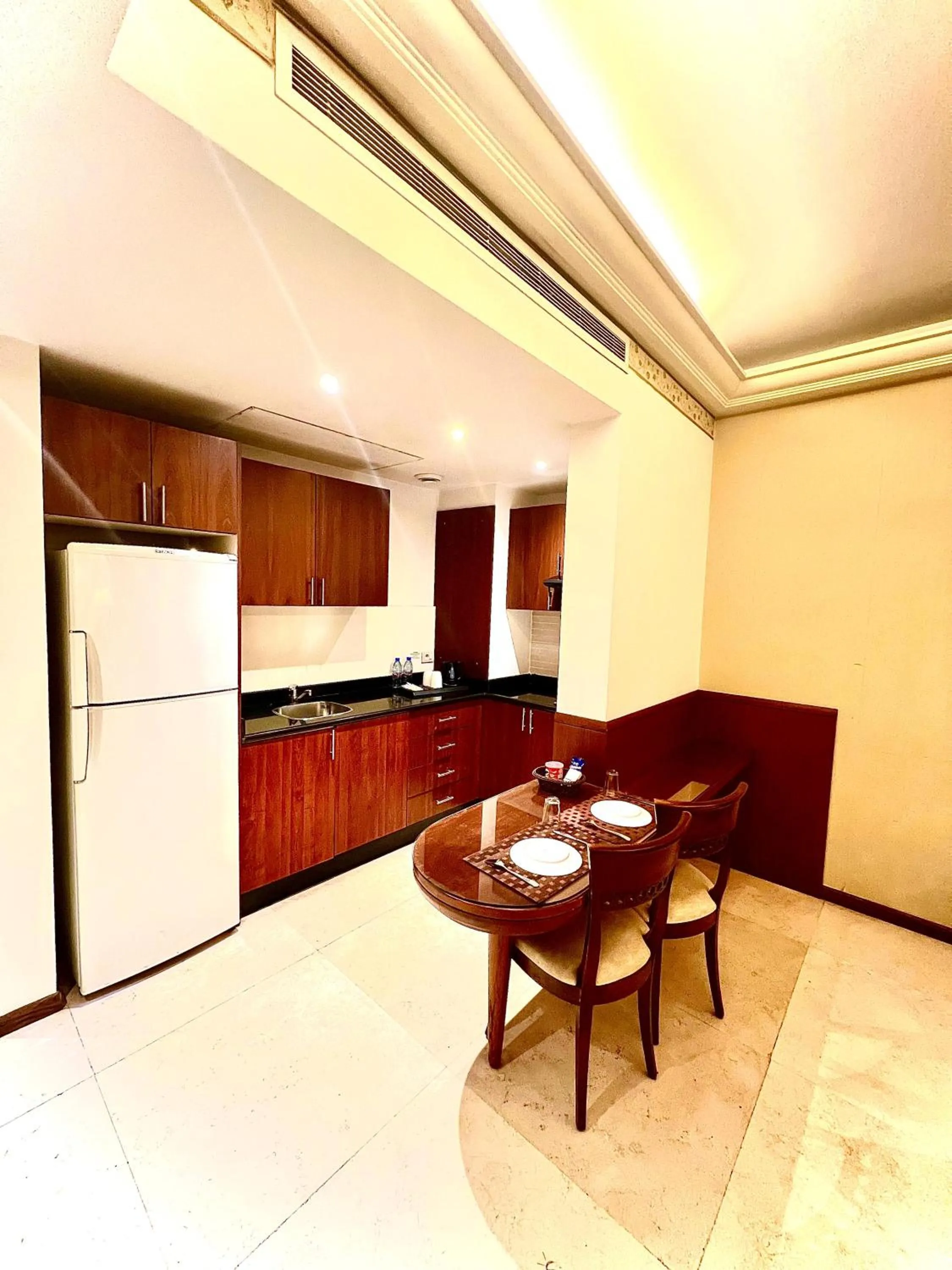 Kitchen or kitchenette in King Suites Hotel