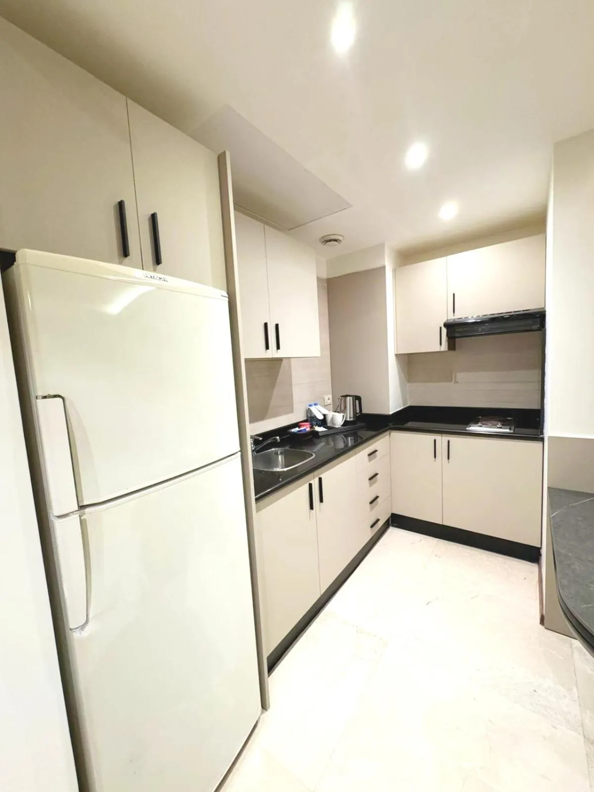 Kitchen or kitchenette in King Suites Hotel