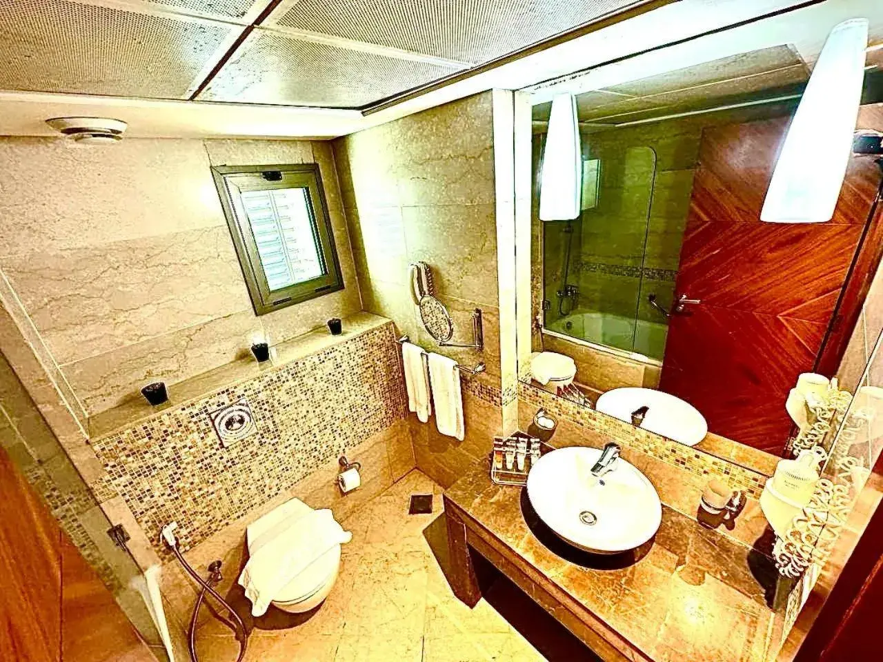 Bathroom in King Suites Hotel Bathroom in King Suites Hotel