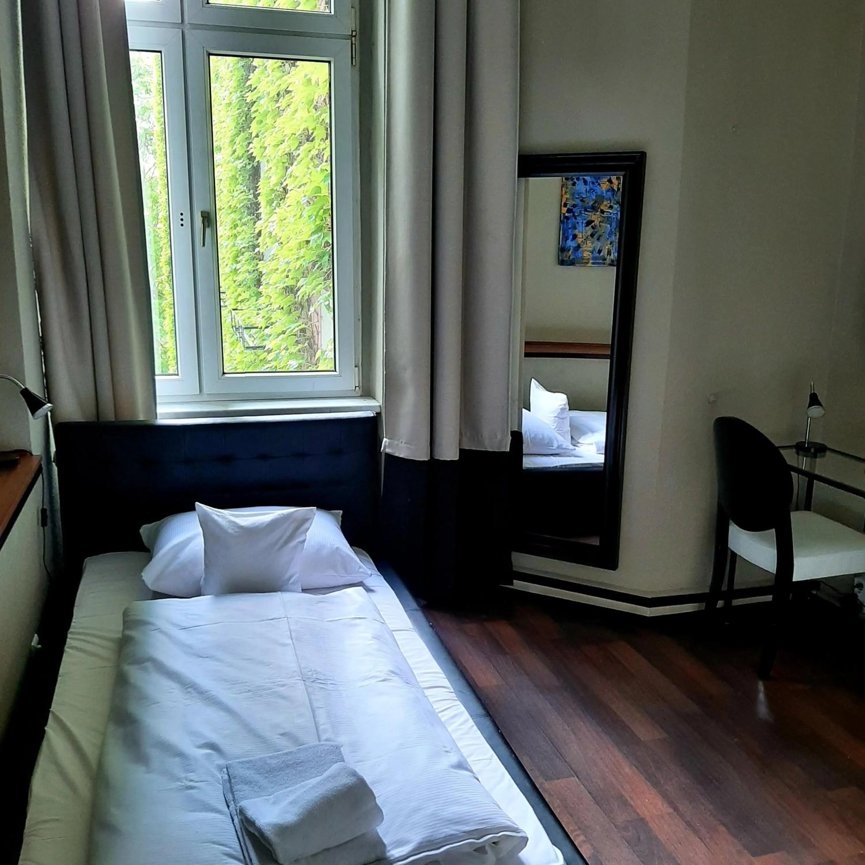 Bed in ArtHotel Connection