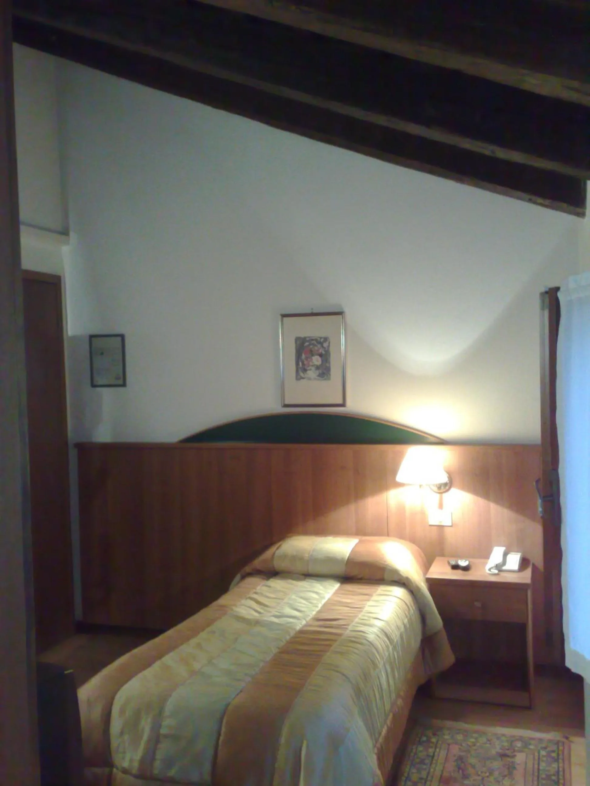 Bed in Locanda Stella D'oro