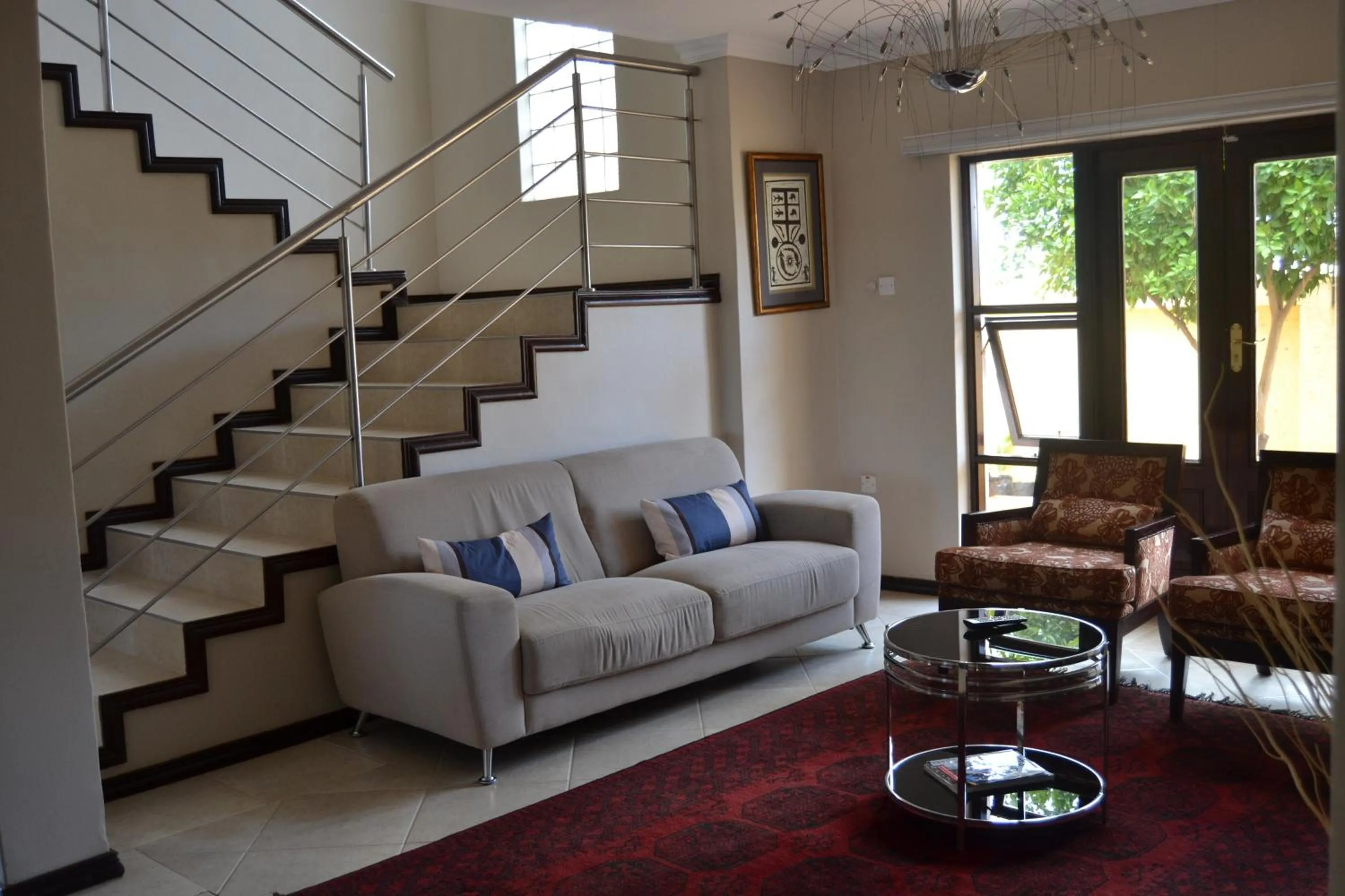 Lobby or reception in The Capital Guest House