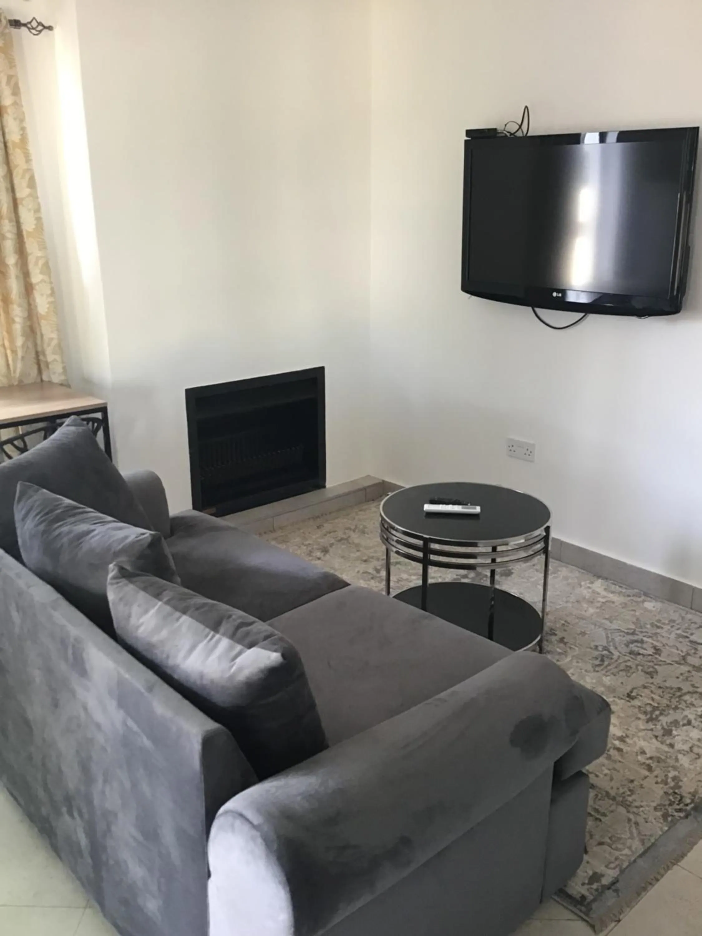 Lounge or bar in The Capital Guest House