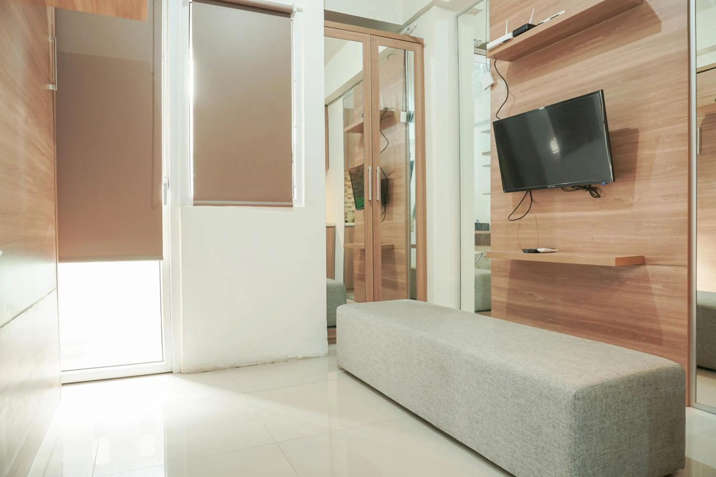 Lovely and Strategic Studio at Green Pramuka Apartment By Travelio