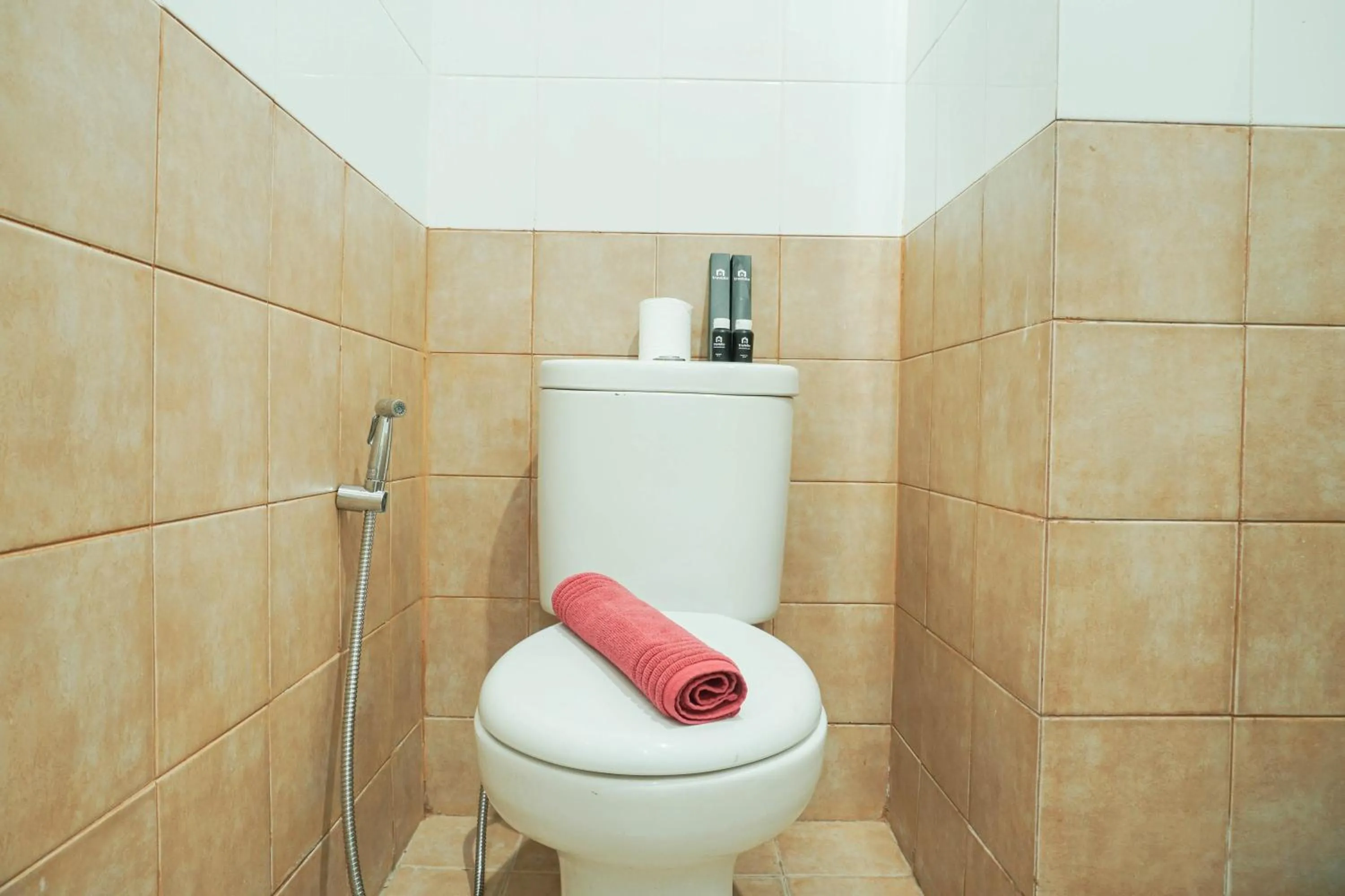 Bathroom in Lovely and Strategic Studio at Green Pramuka Apartment By Travelio