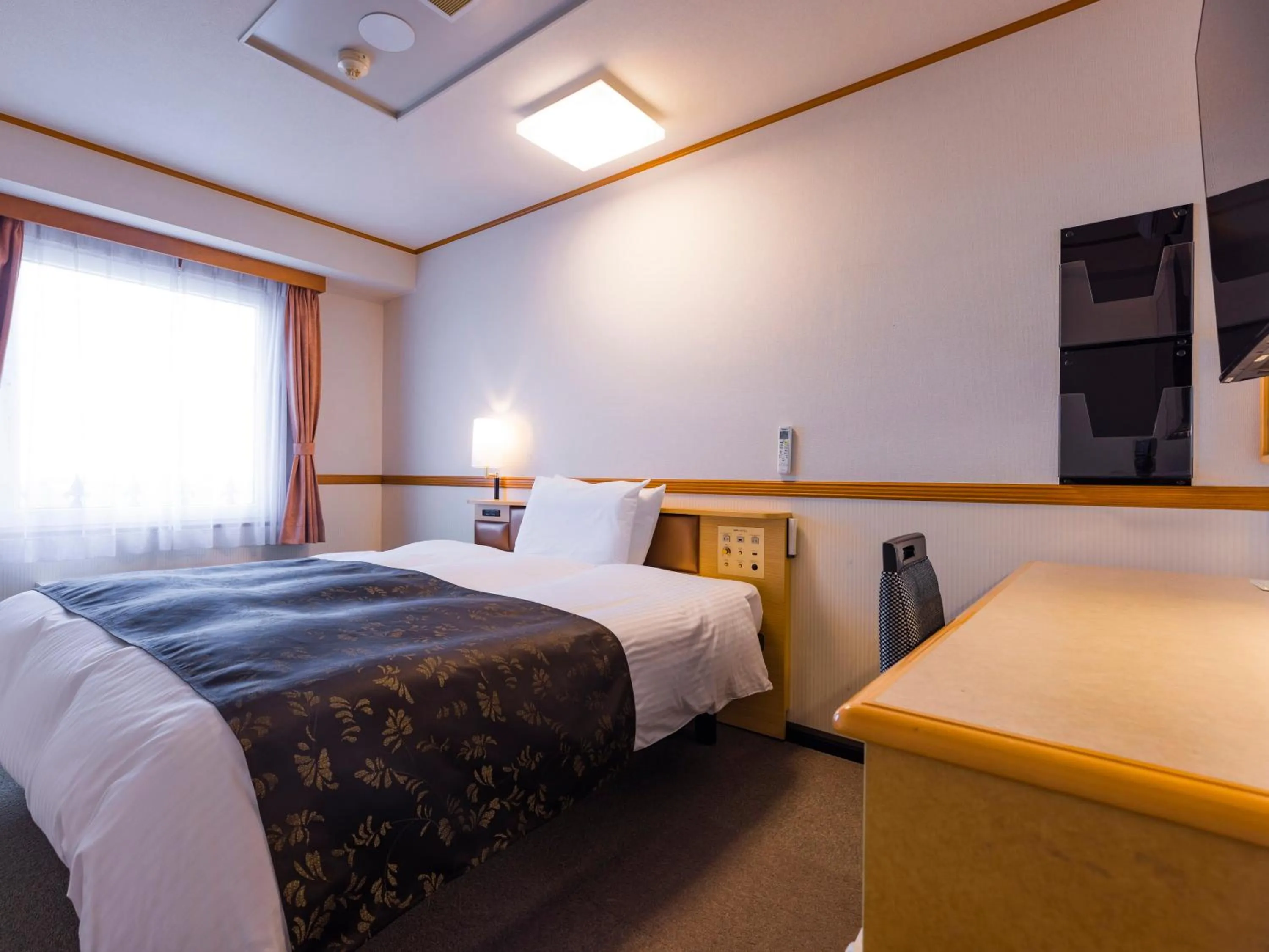 Photo of the whole room, Bed in APA Hotel Miyagi Furukawa Ekimae