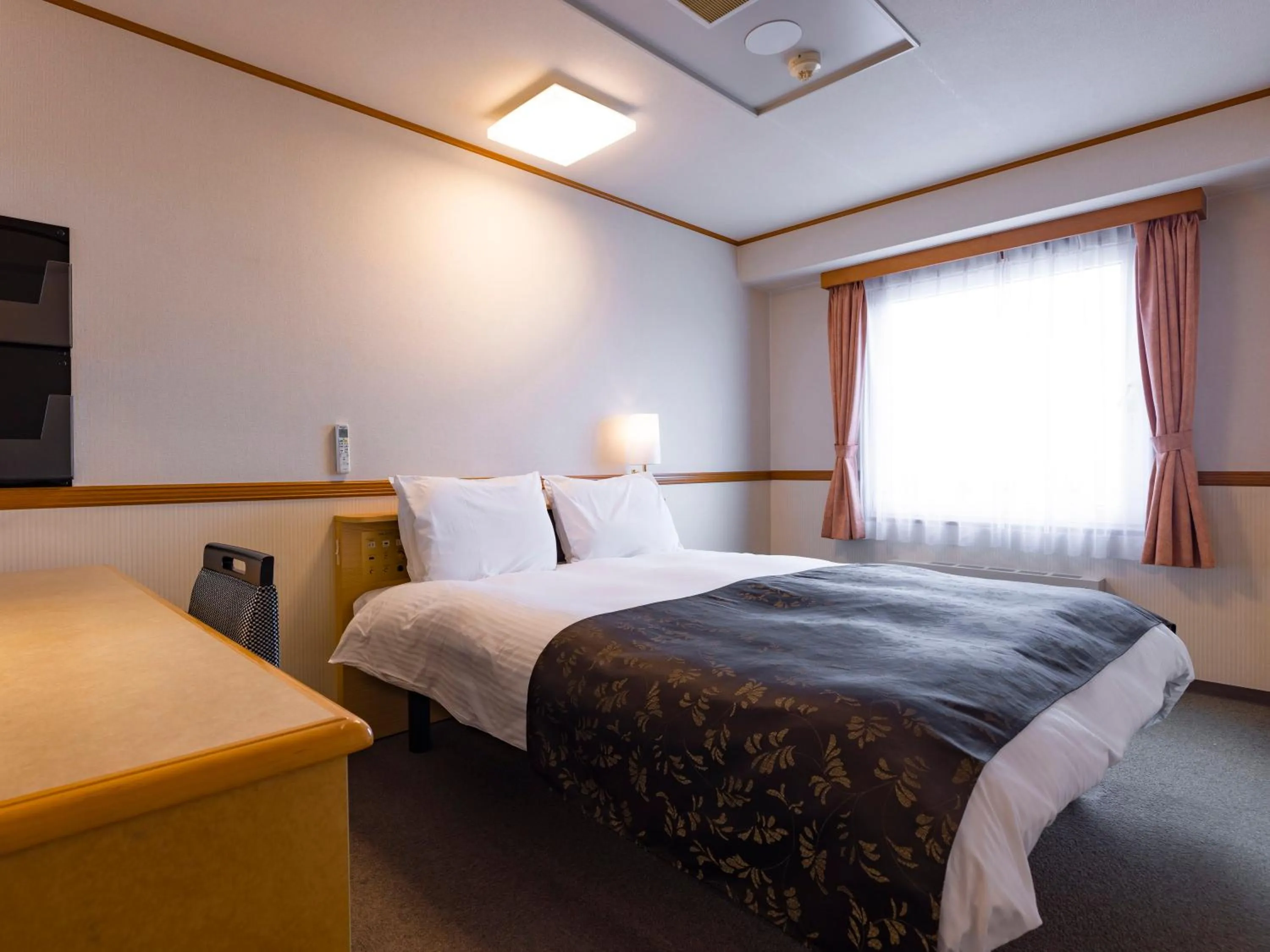 Photo of the whole room, Bed in APA Hotel Miyagi Furukawa Ekimae