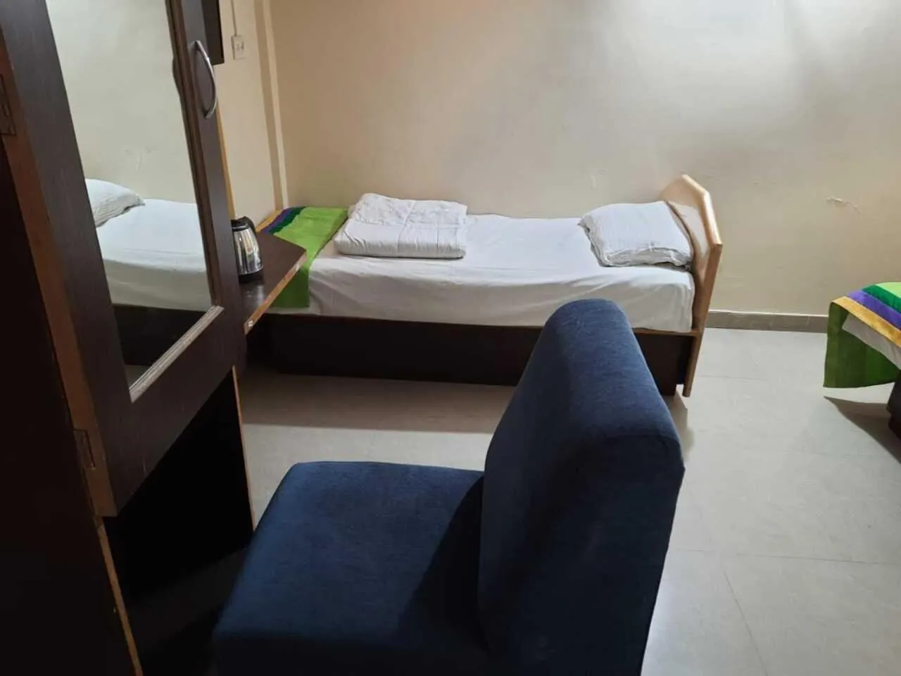 Photo of the whole room, Bed in Abhimaan Residency