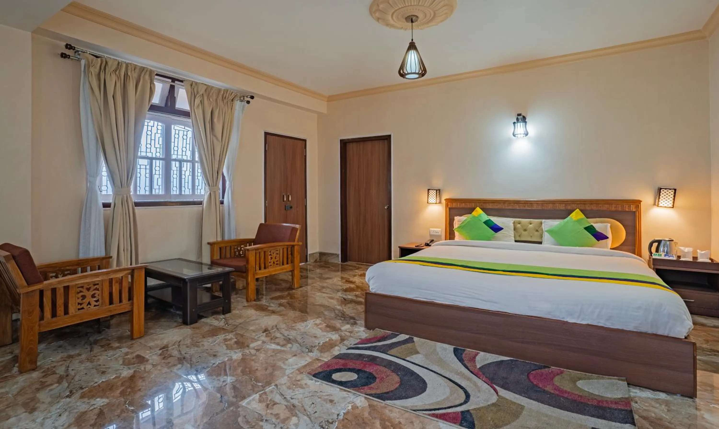 Bed in Treebo Regal Residency A Boutique