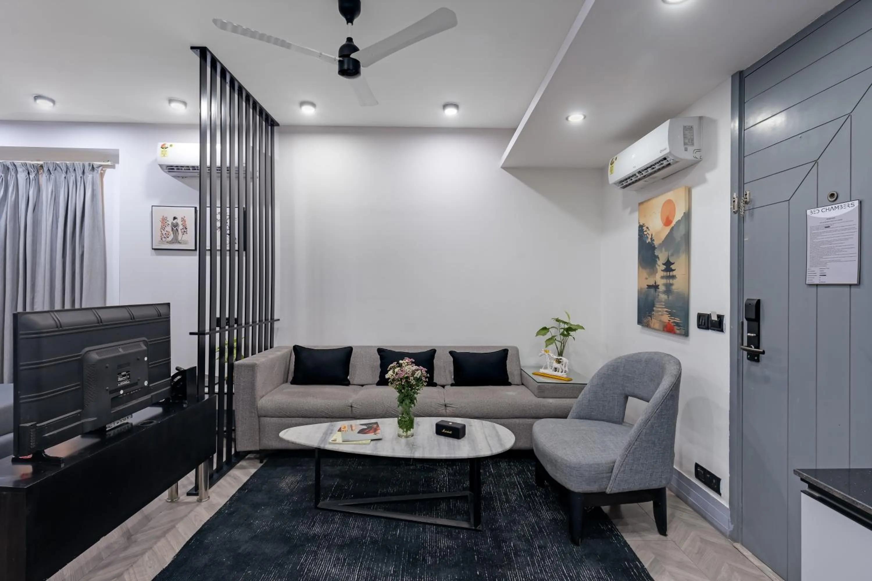 TV and multimedia in BedChambers Serviced Apartments, MG ROAD