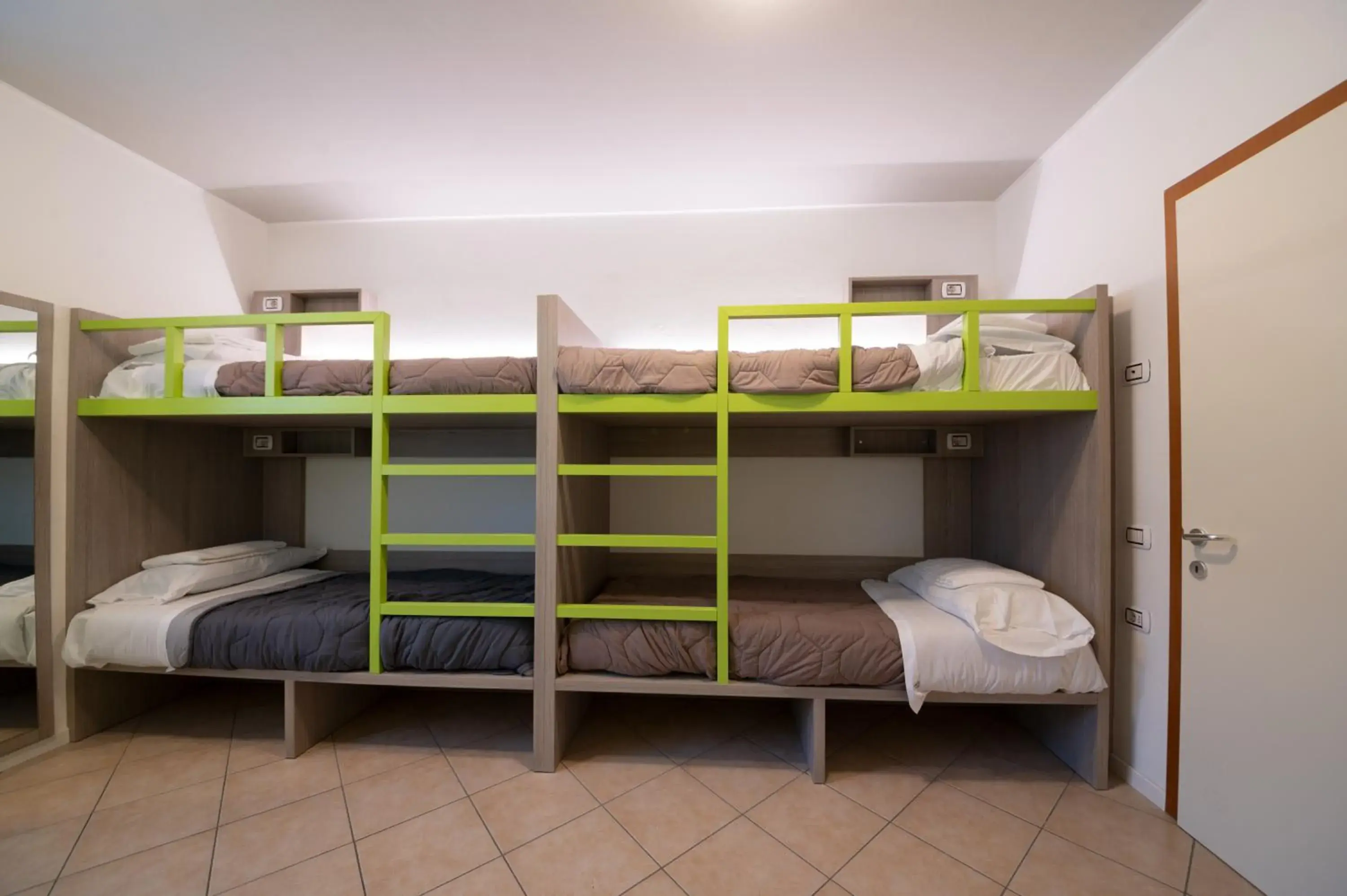 Quadruple Room with Private Bathroom in Ostello Città di Rovereto Quadruple Room with Private Bathroom in Ostello Città di Rovereto