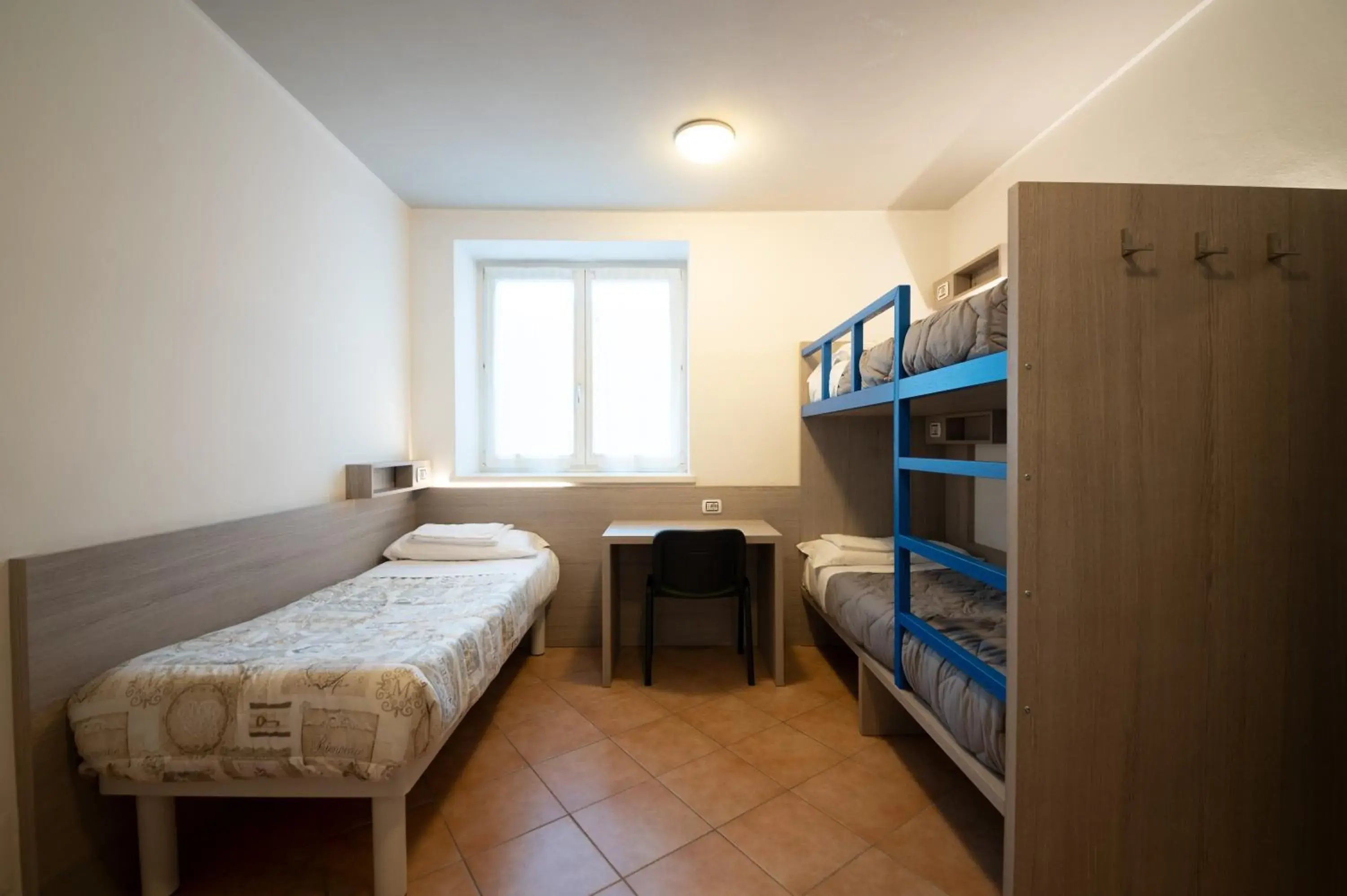 Classic Triple Room in Ostello Città di Rovereto Classic Triple Room in Ostello Città di Rovereto