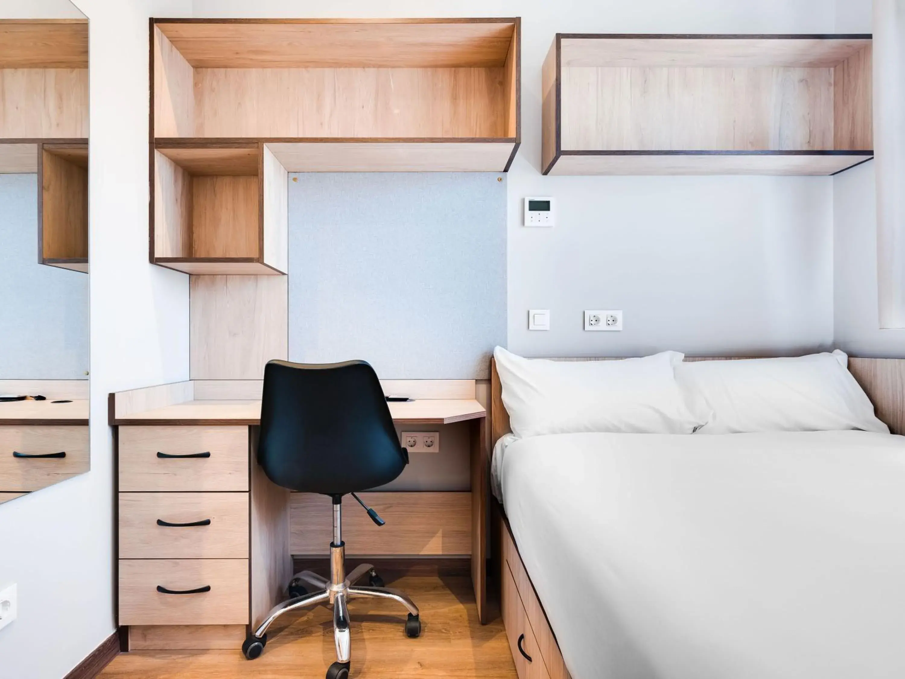 Bed in Livensa Living Studios Málaga Feria Bed in Livensa Living Studios Málaga Feria