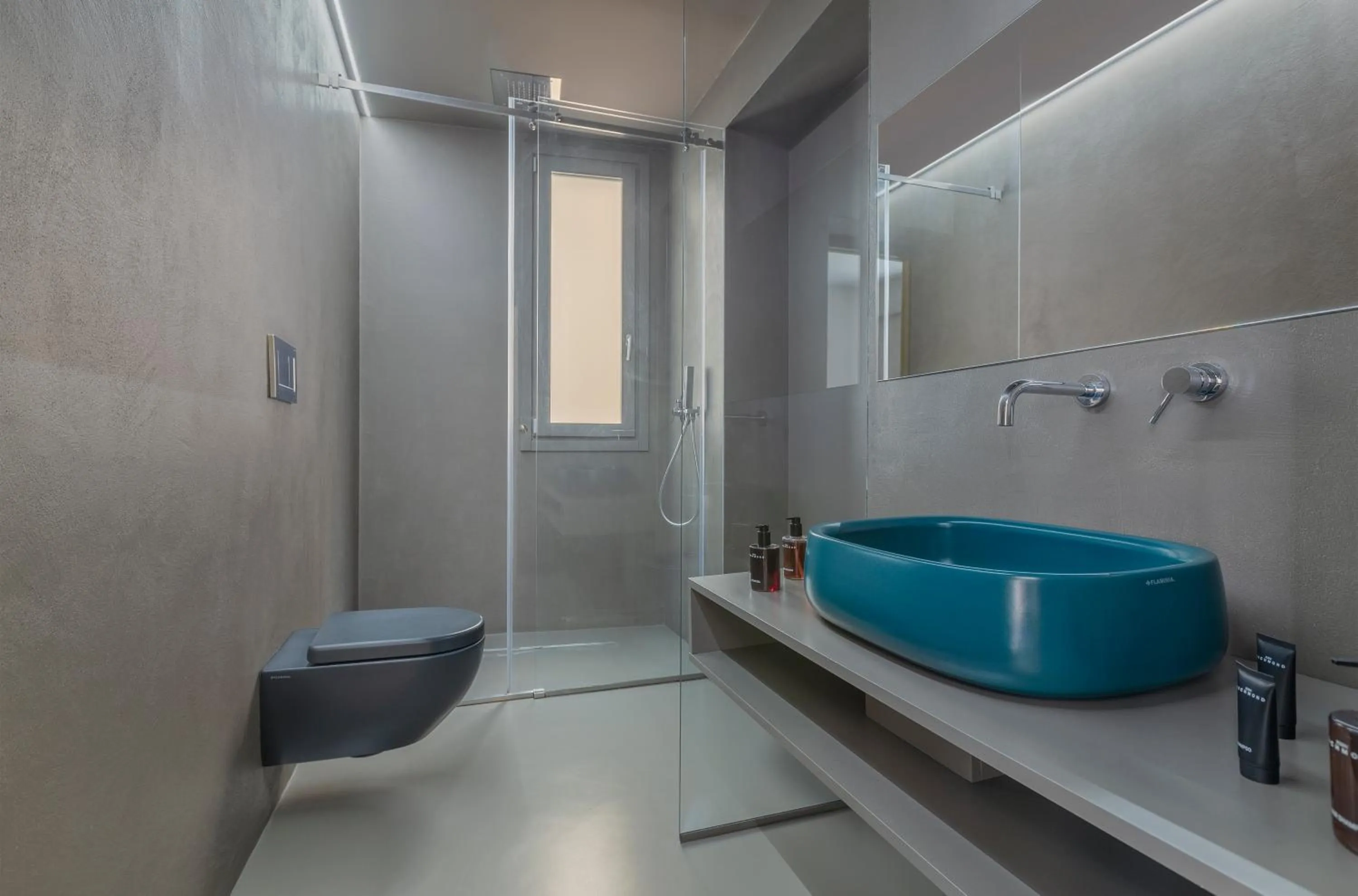 Toilet in Fiveplace Design Suites & Apartments