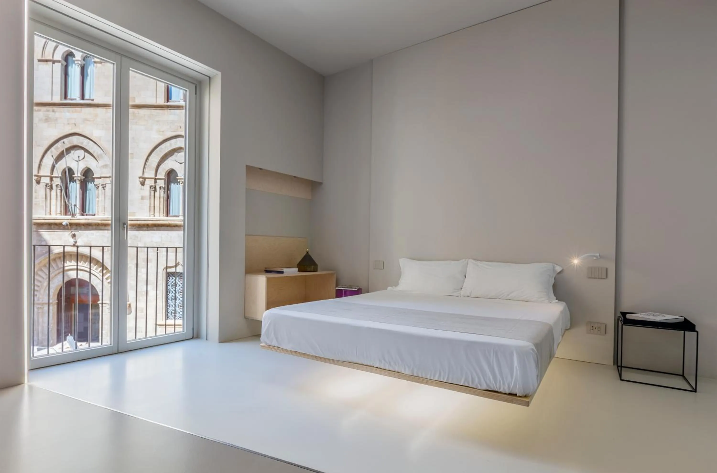 Seating area, Bed in Fiveplace Design Suites & Apartments