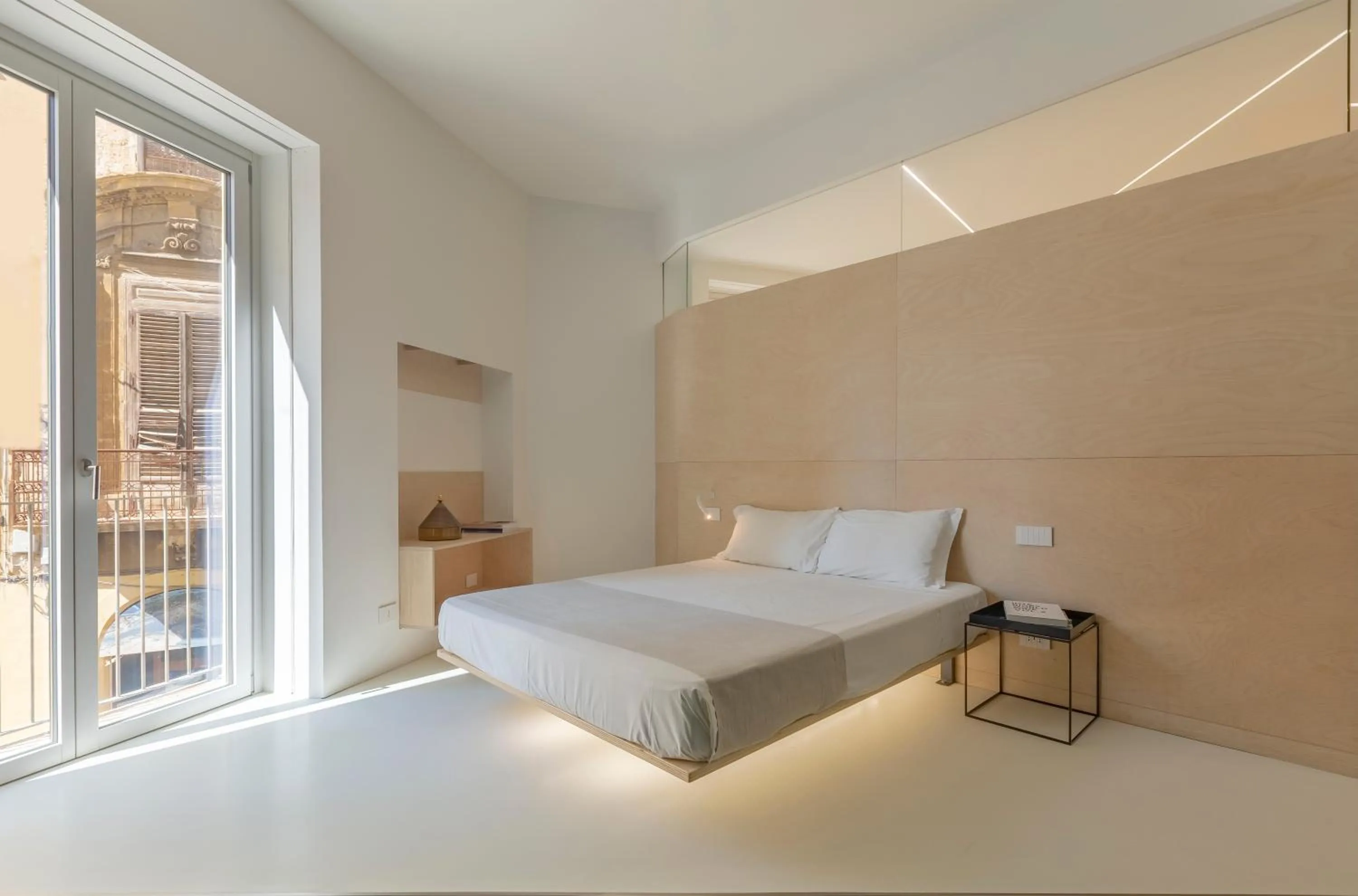 Bed in Fiveplace Design Suites & Apartments