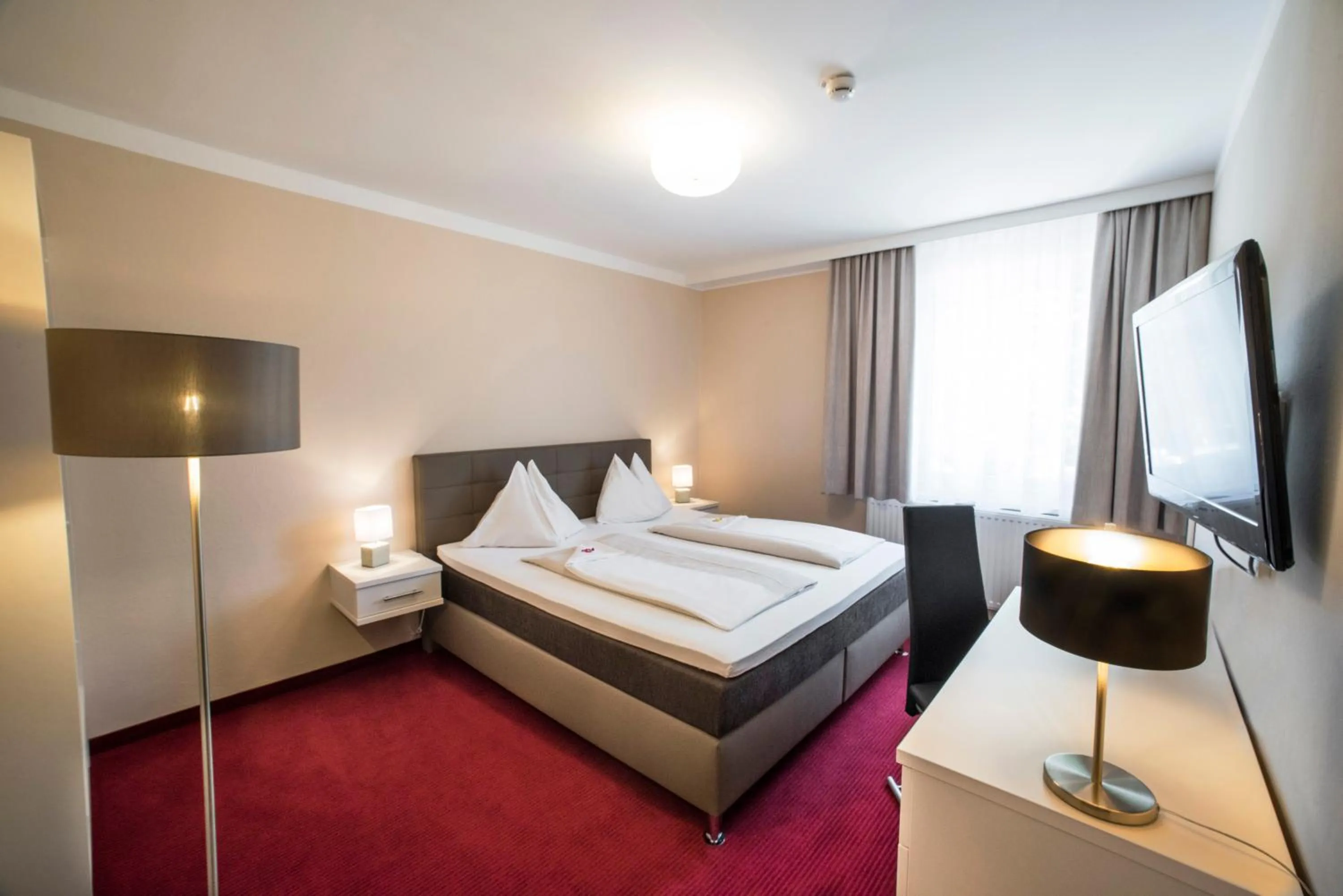 Bed in Stadthotel Kramer