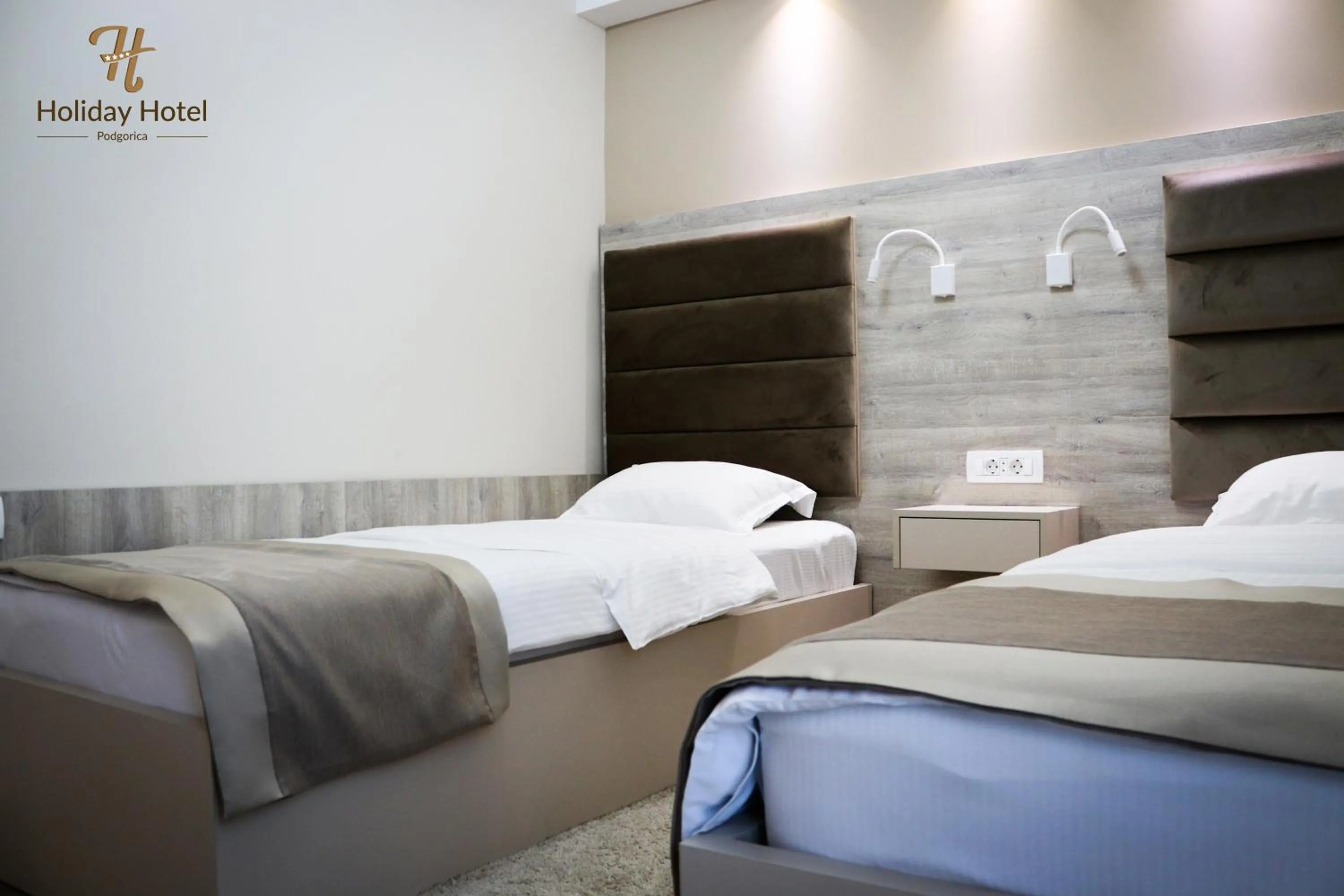 Bed in Hotel Holiday