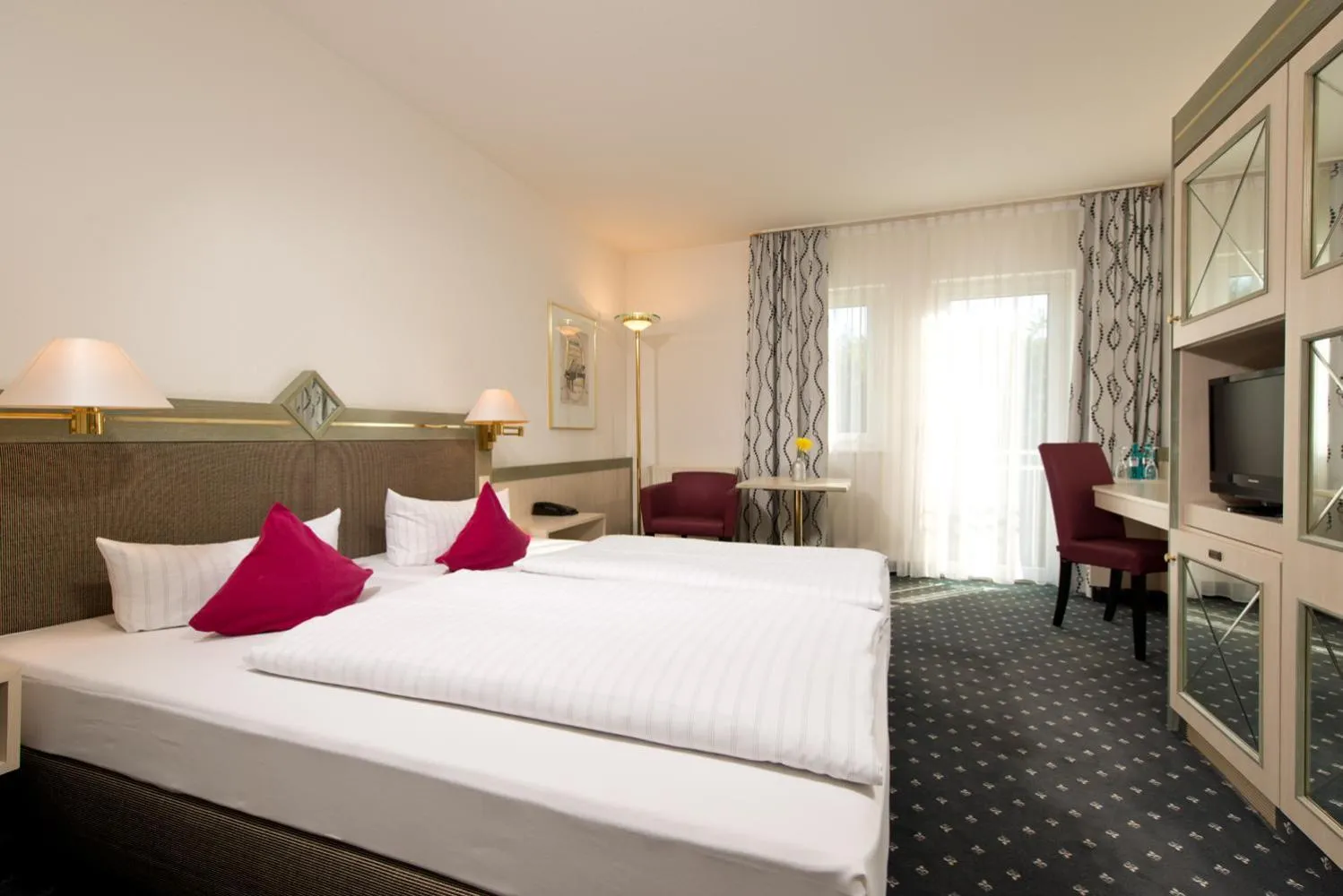Photo of the whole room, Bed in ACHAT Hotel Reilingen Walldorf