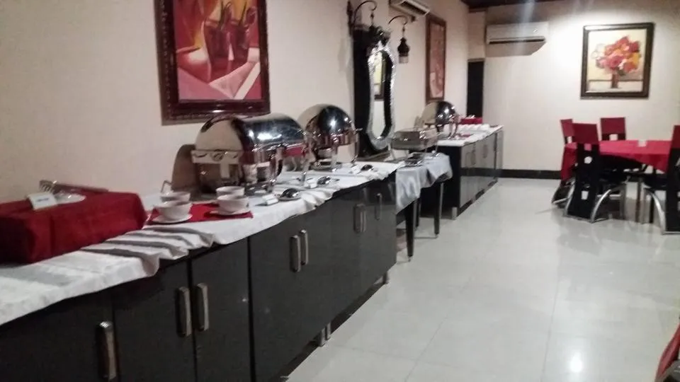 Restaurant/places to eat in Urban Rose Hotel & Apartments