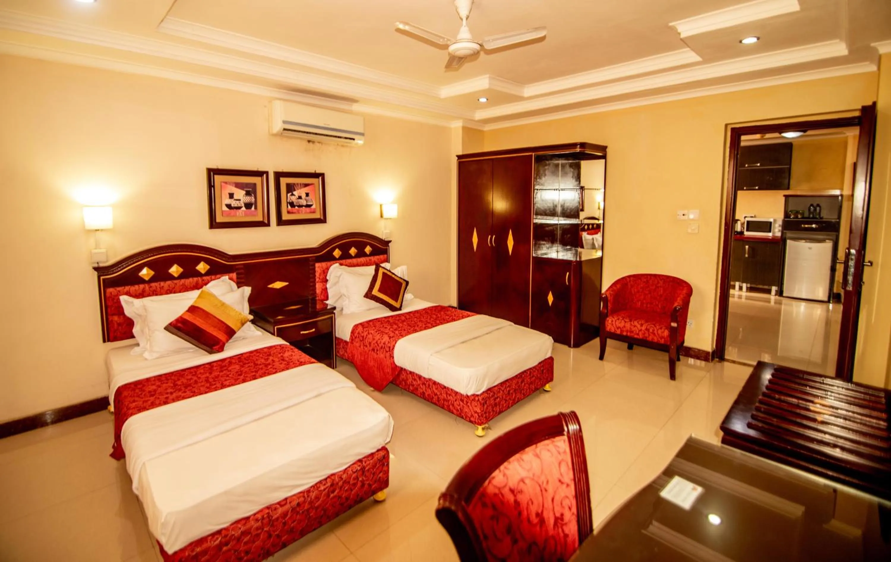 Bedroom, Bed in Urban Rose Hotel & Apartments