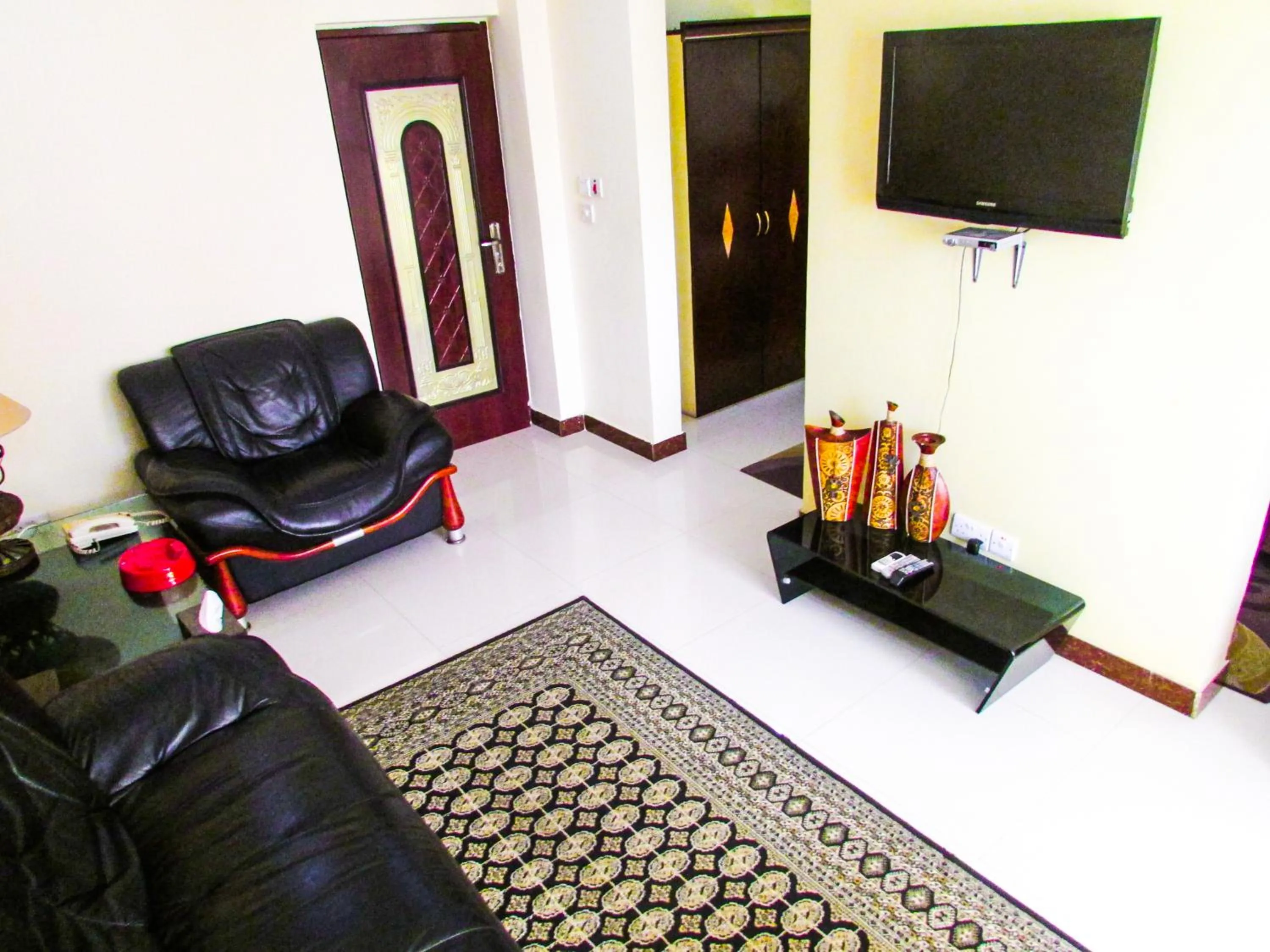 Living room in Urban Rose Hotel & Apartments