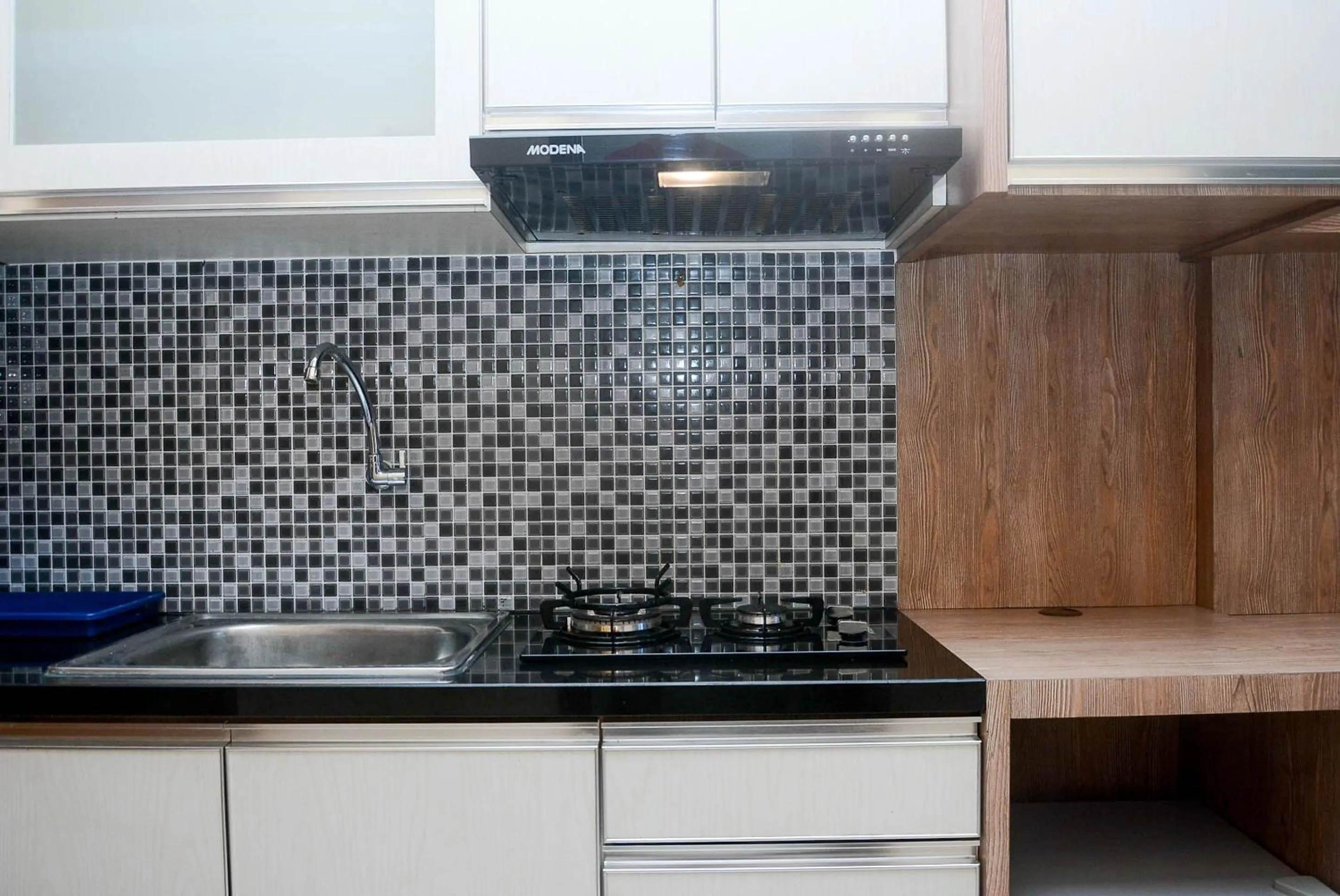 Kitchen or kitchenette in Gorgeous and Strategic Studio Apartment at Capitol Park Residence By Travelio