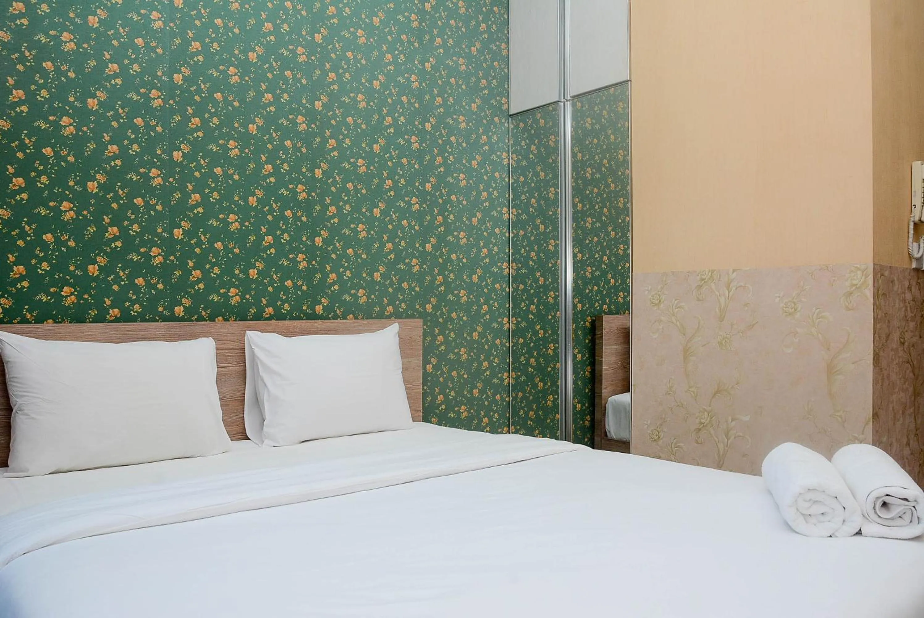 Bed in Gorgeous and Strategic Studio Apartment at Capitol Park Residence By Travelio