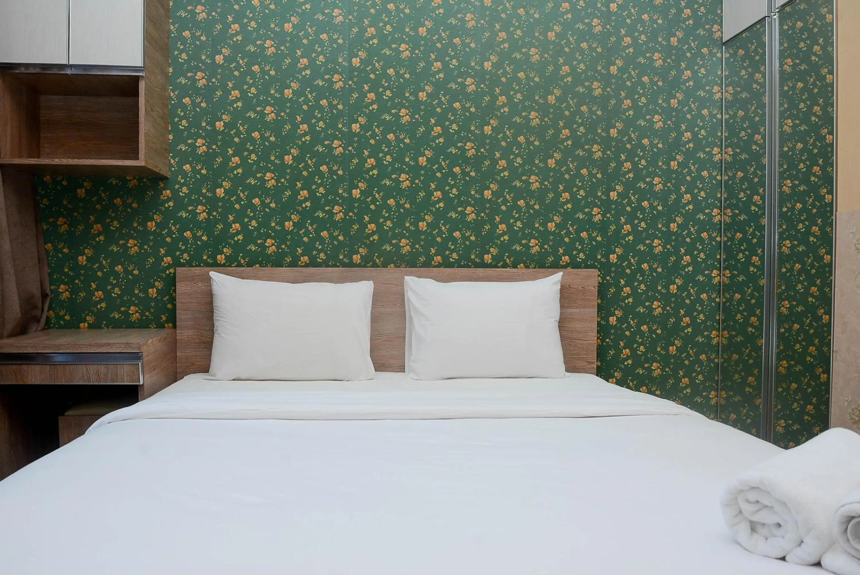 Bed in Gorgeous and Strategic Studio Apartment at Capitol Park Residence By Travelio